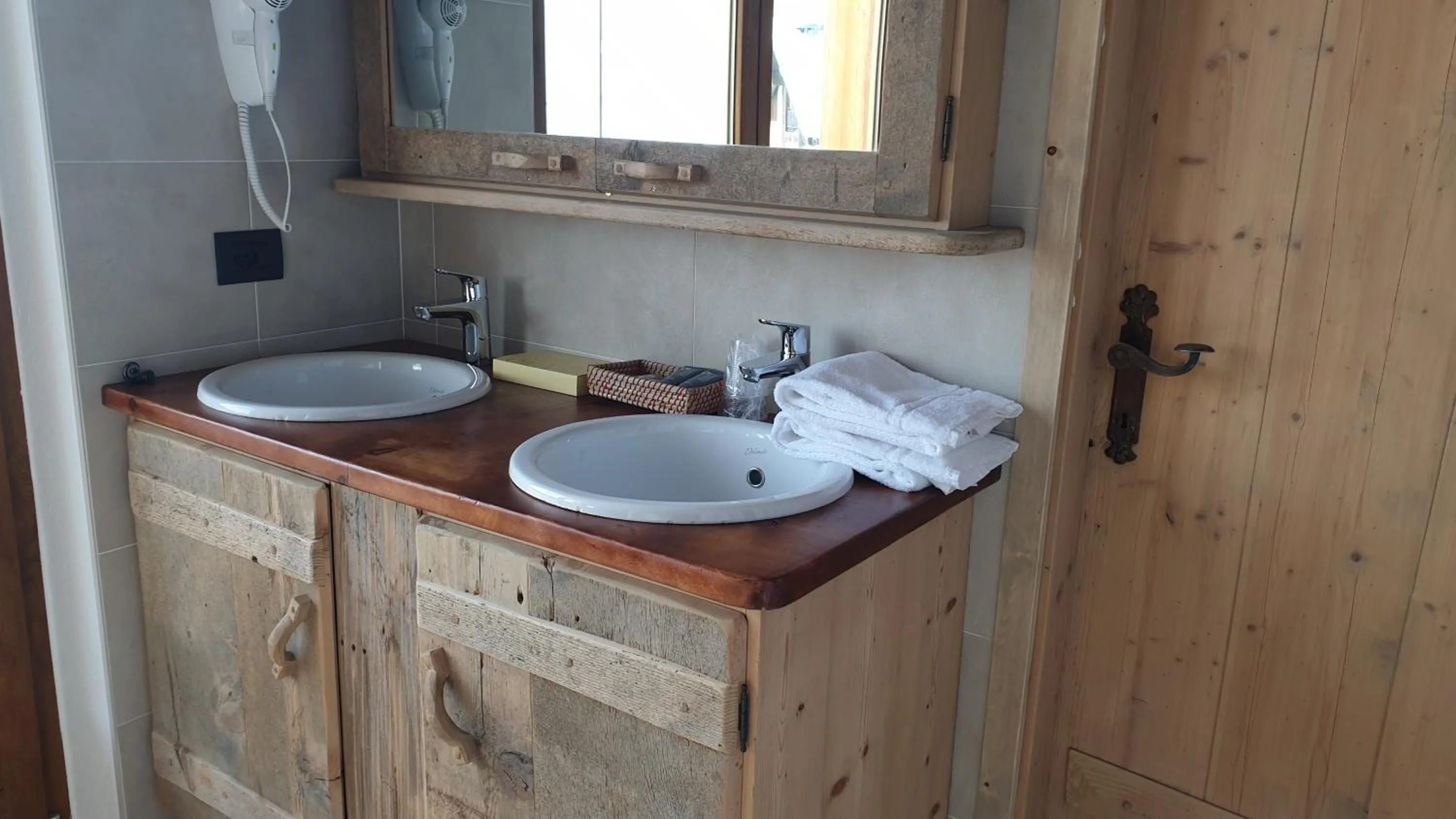 Bathroom in Alpino Lodge Bivio