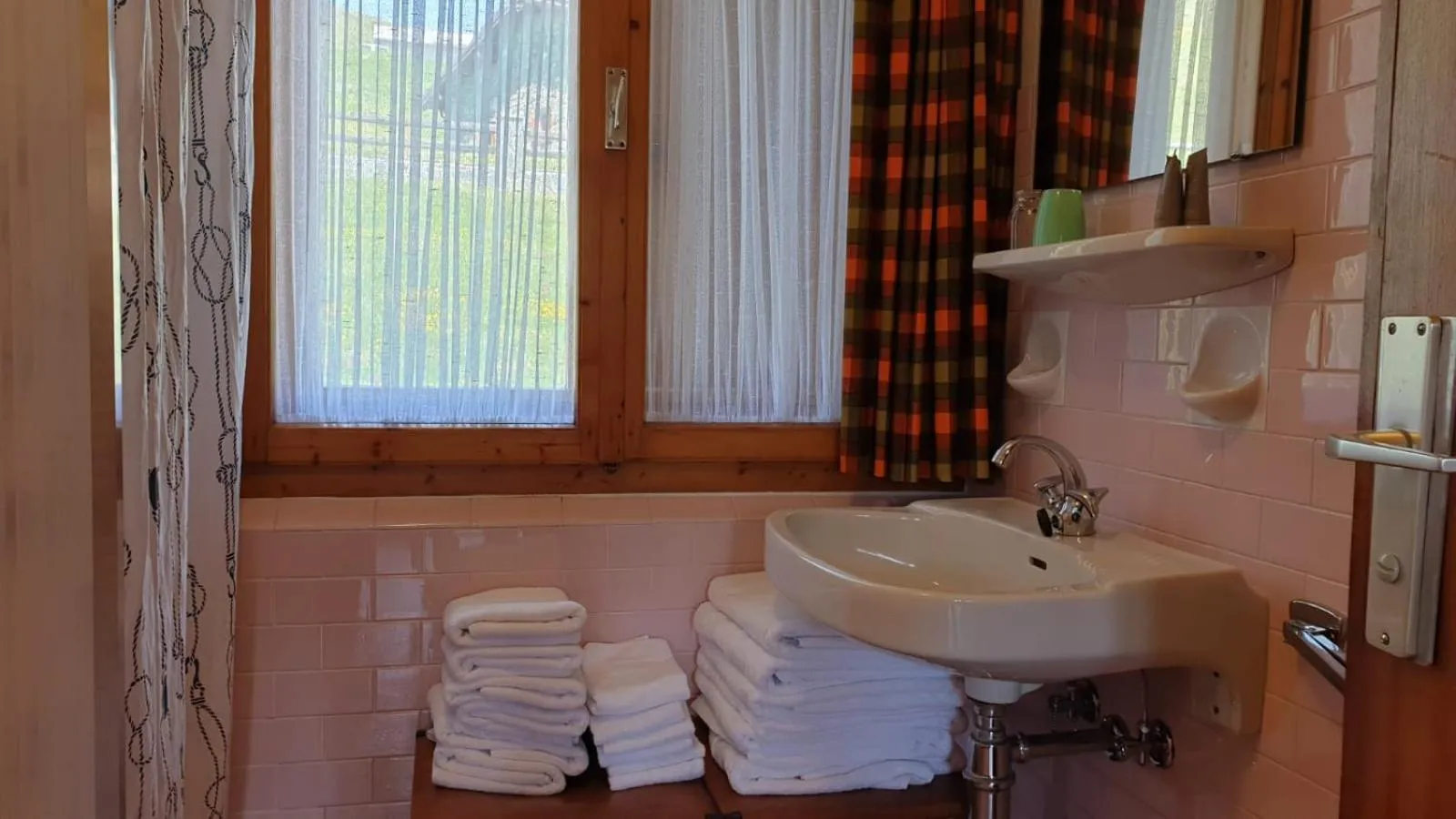 Bathroom in Alpino Lodge Bivio