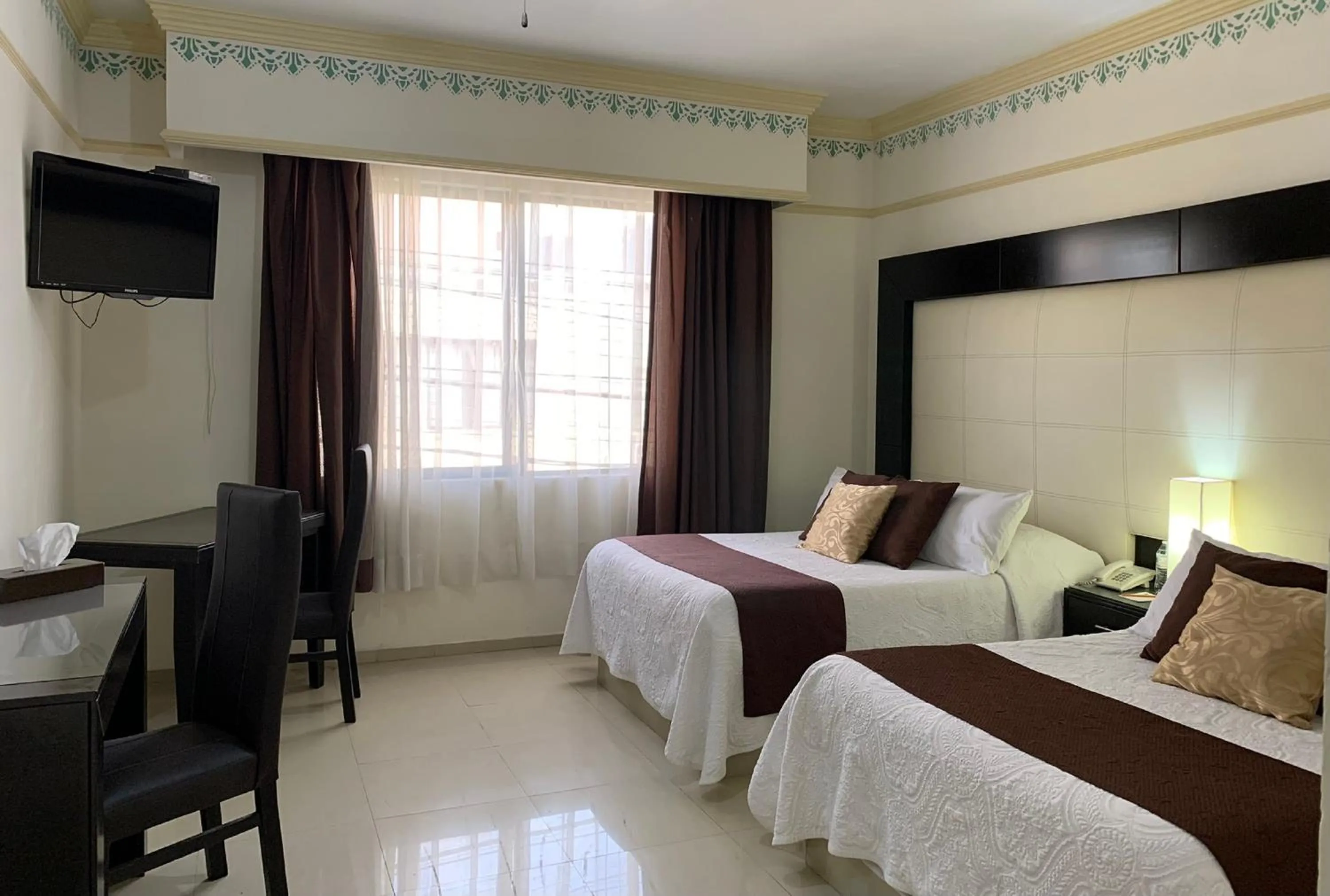 Photo of the whole room, Bed in Hotel Inn Galerias