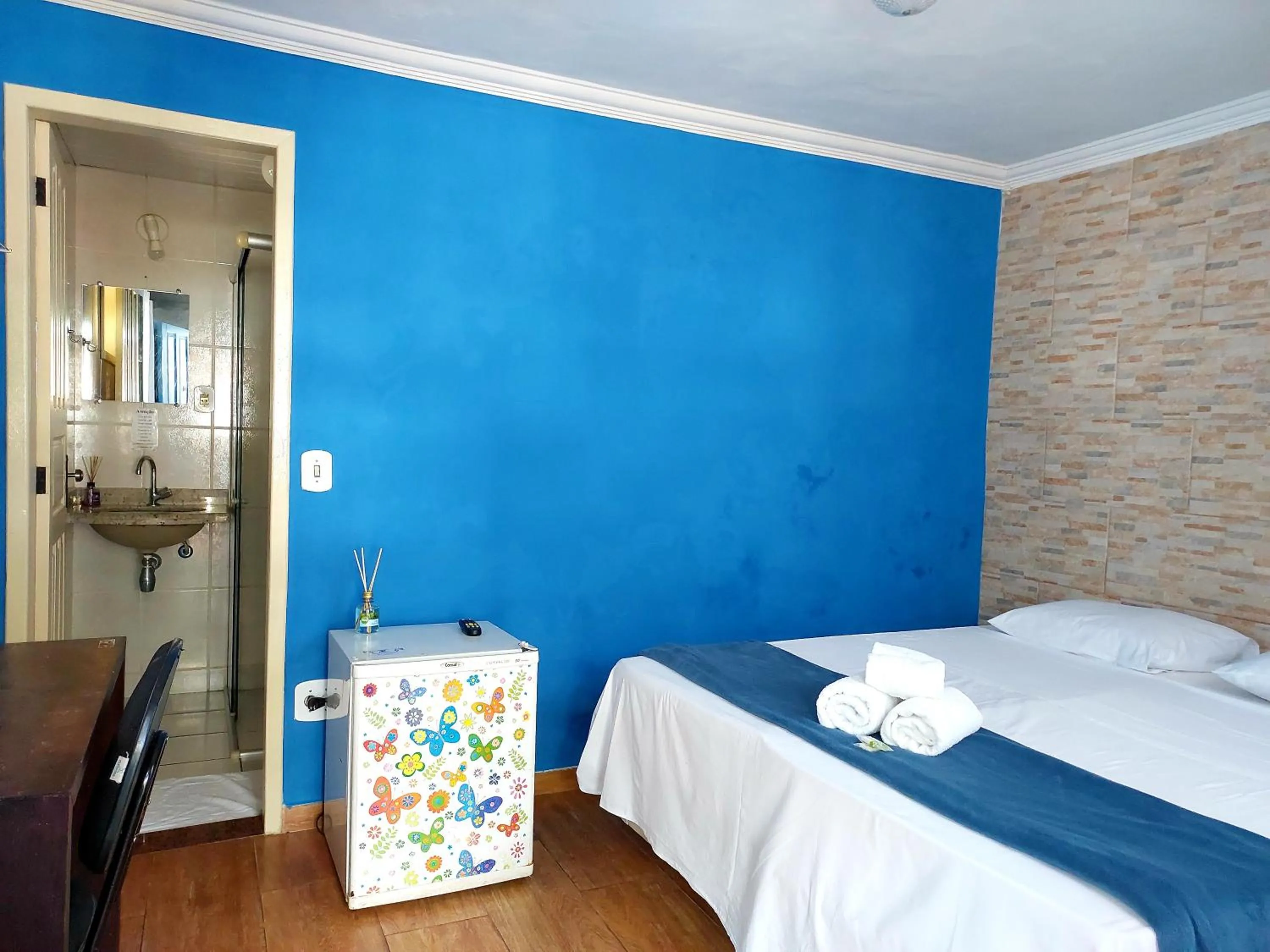 Bed in Pousada Ouro Preto
