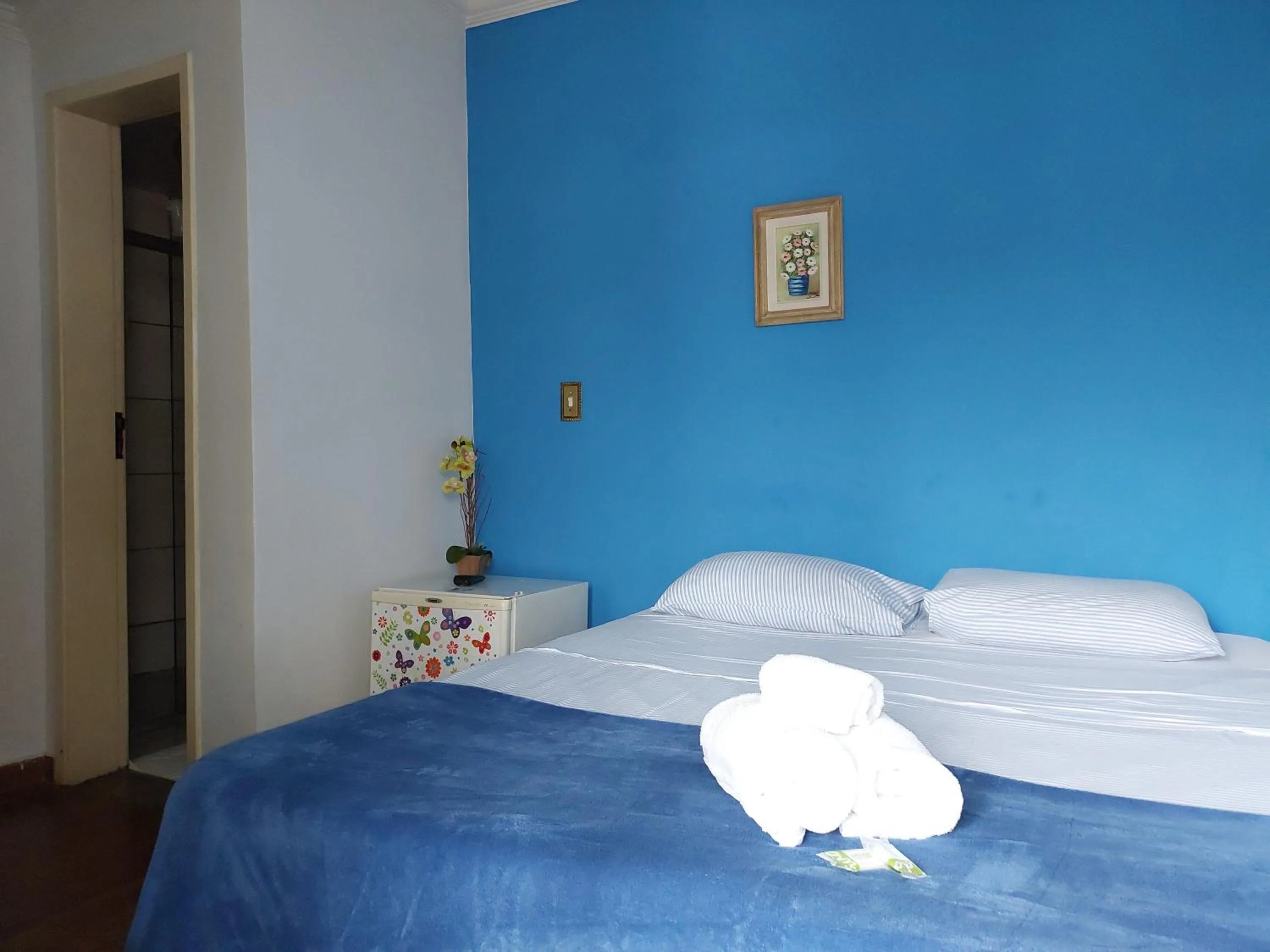 Bed in Pousada Ouro Preto