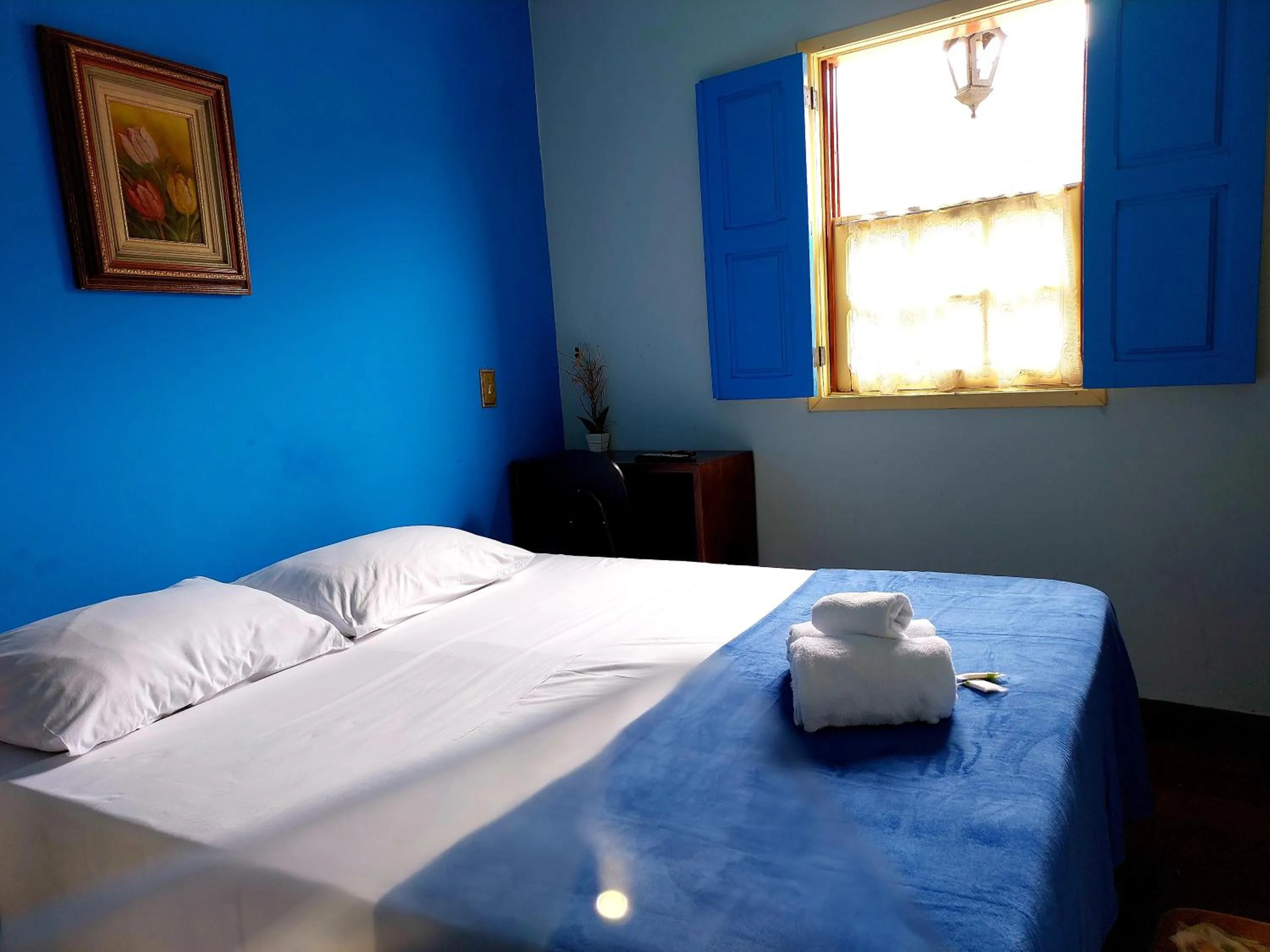 Bed in Pousada Ouro Preto