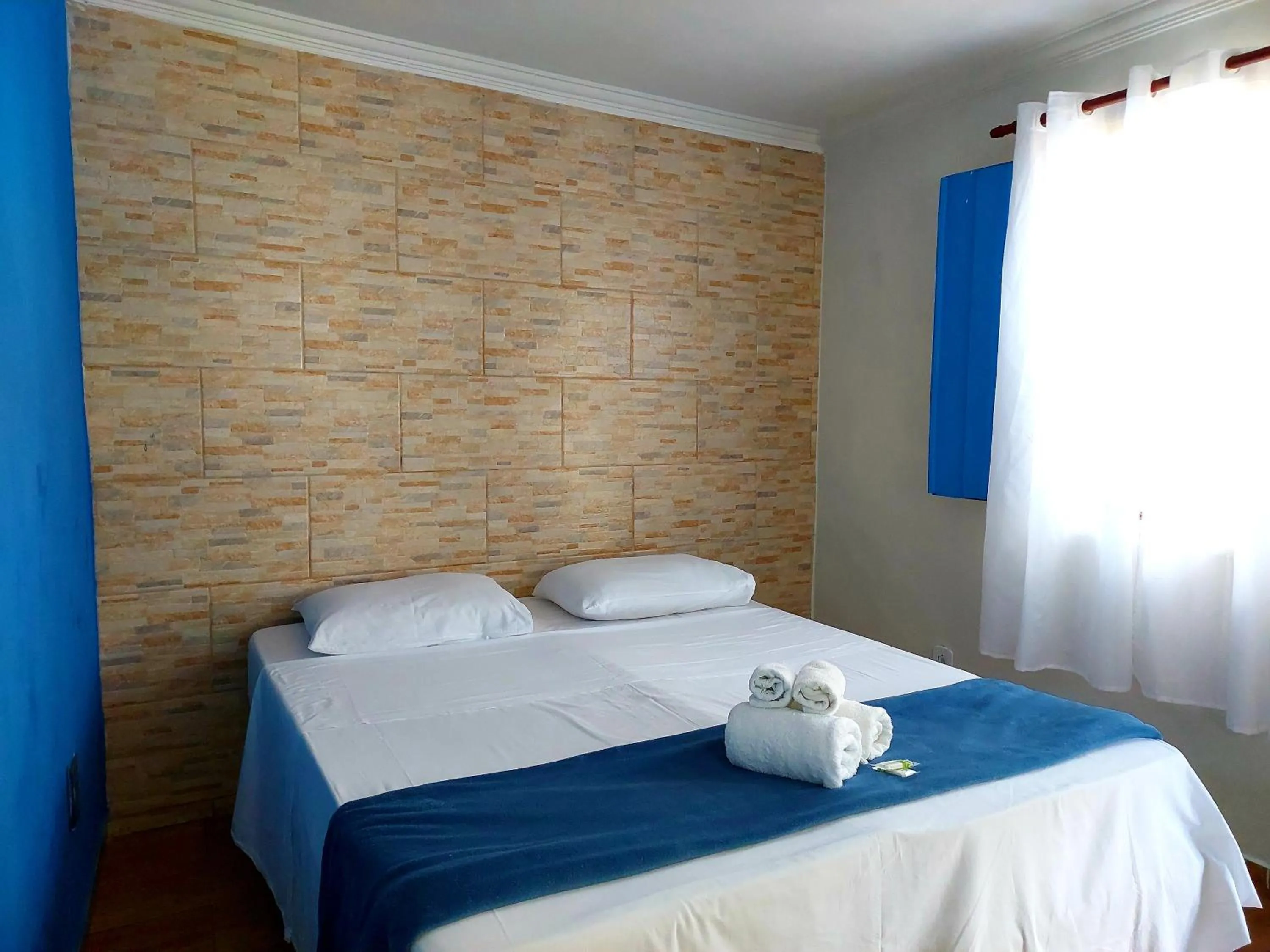 Bed in Pousada Ouro Preto