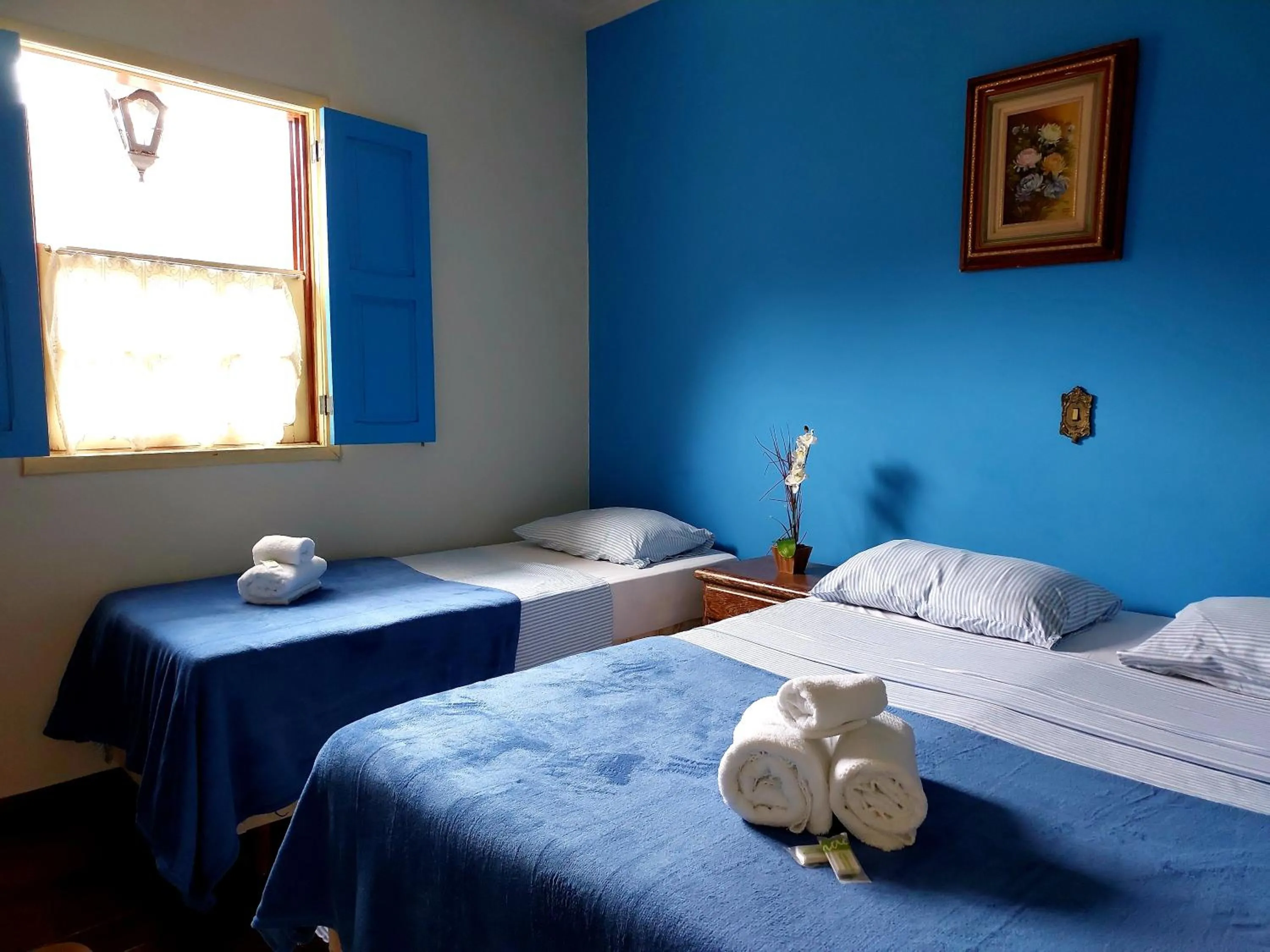 Bed in Pousada Ouro Preto