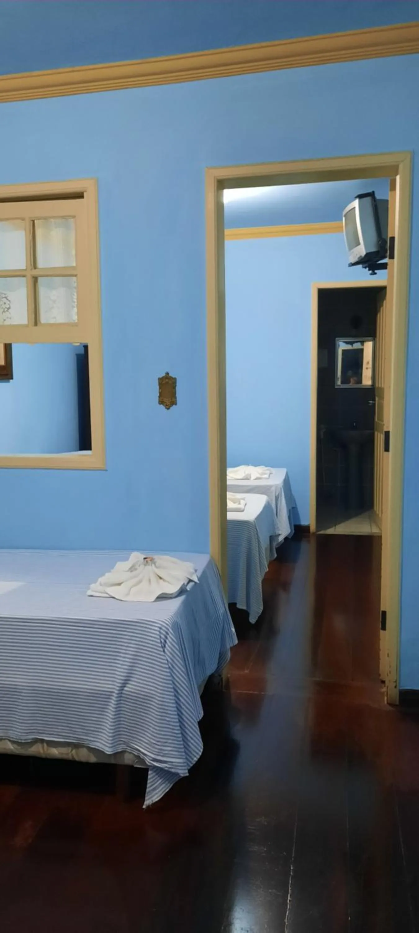 Bed in Pousada Ouro Preto