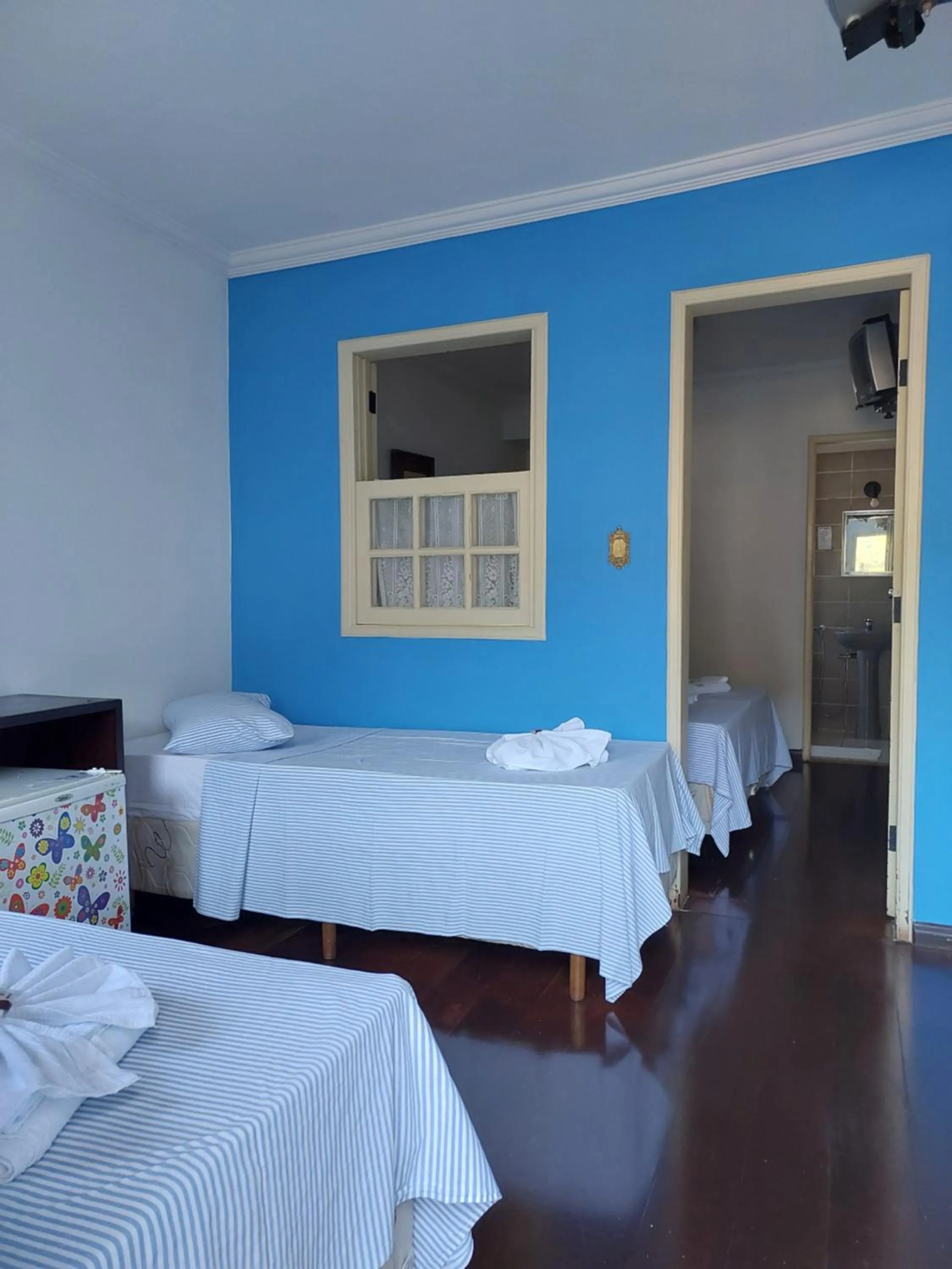 Bed in Pousada Ouro Preto
