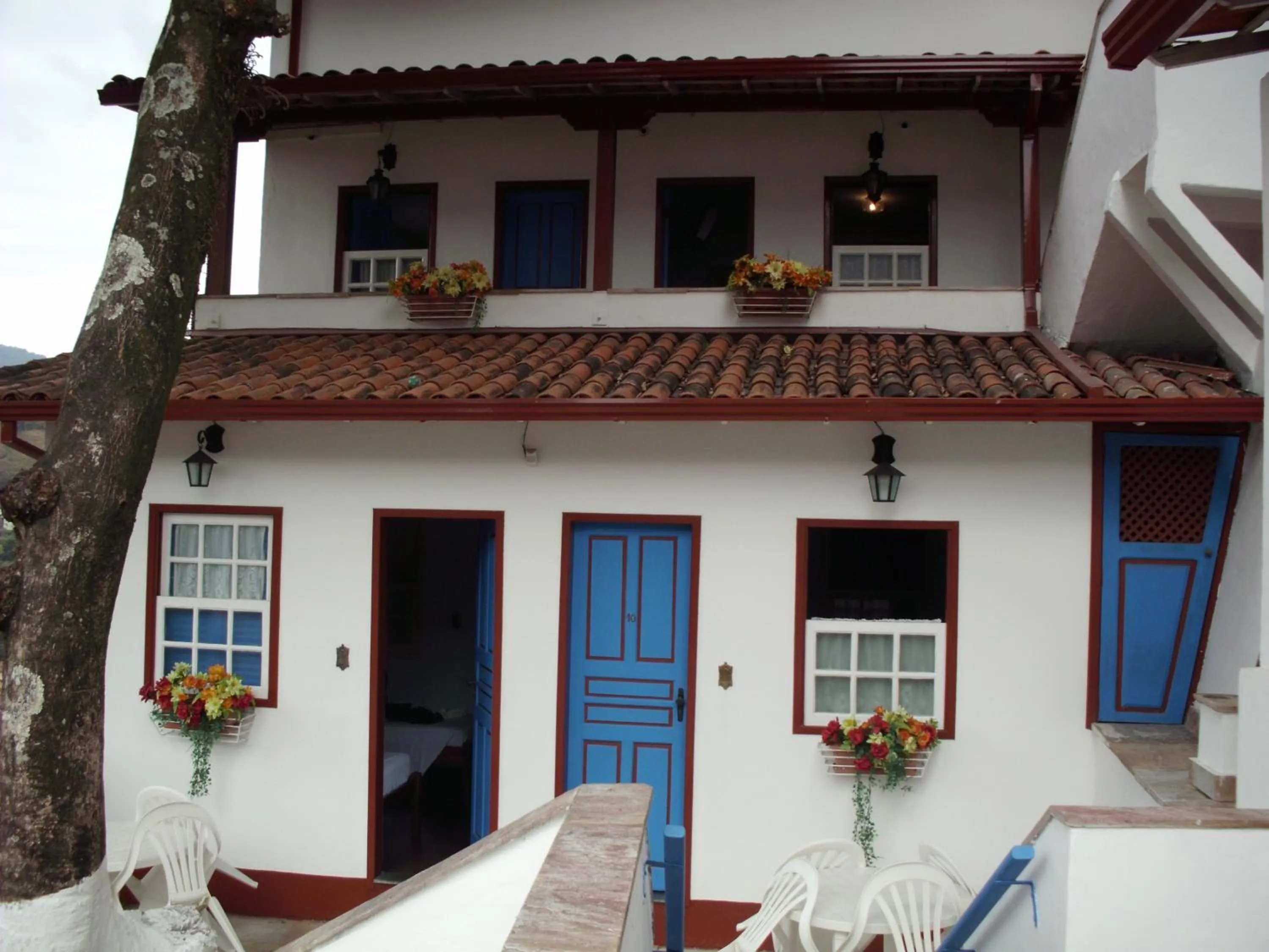 Bed in Pousada Ouro Preto