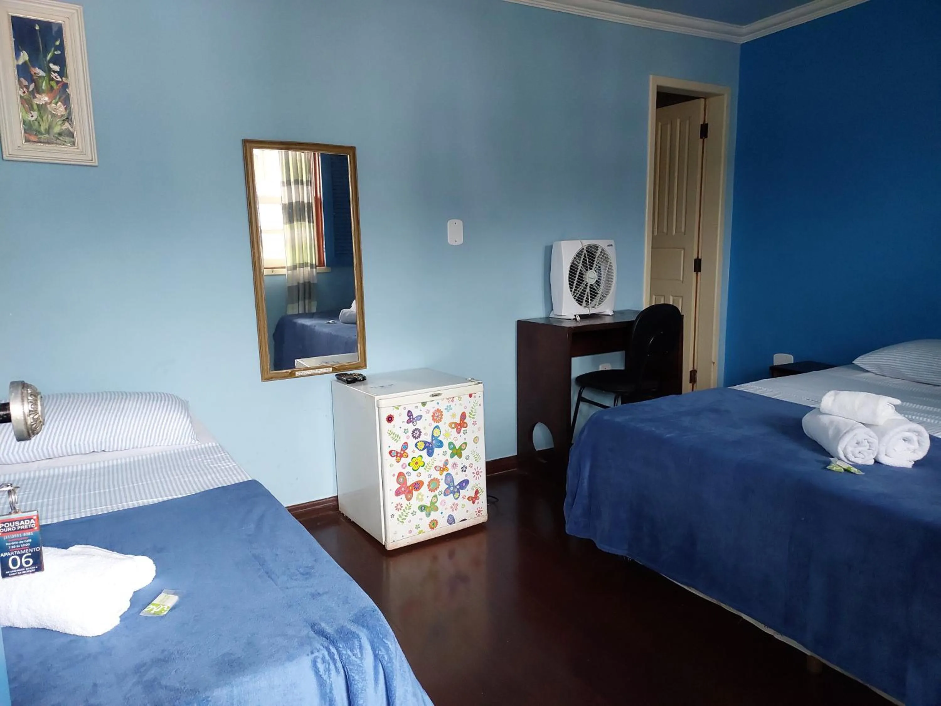Bed in Pousada Ouro Preto