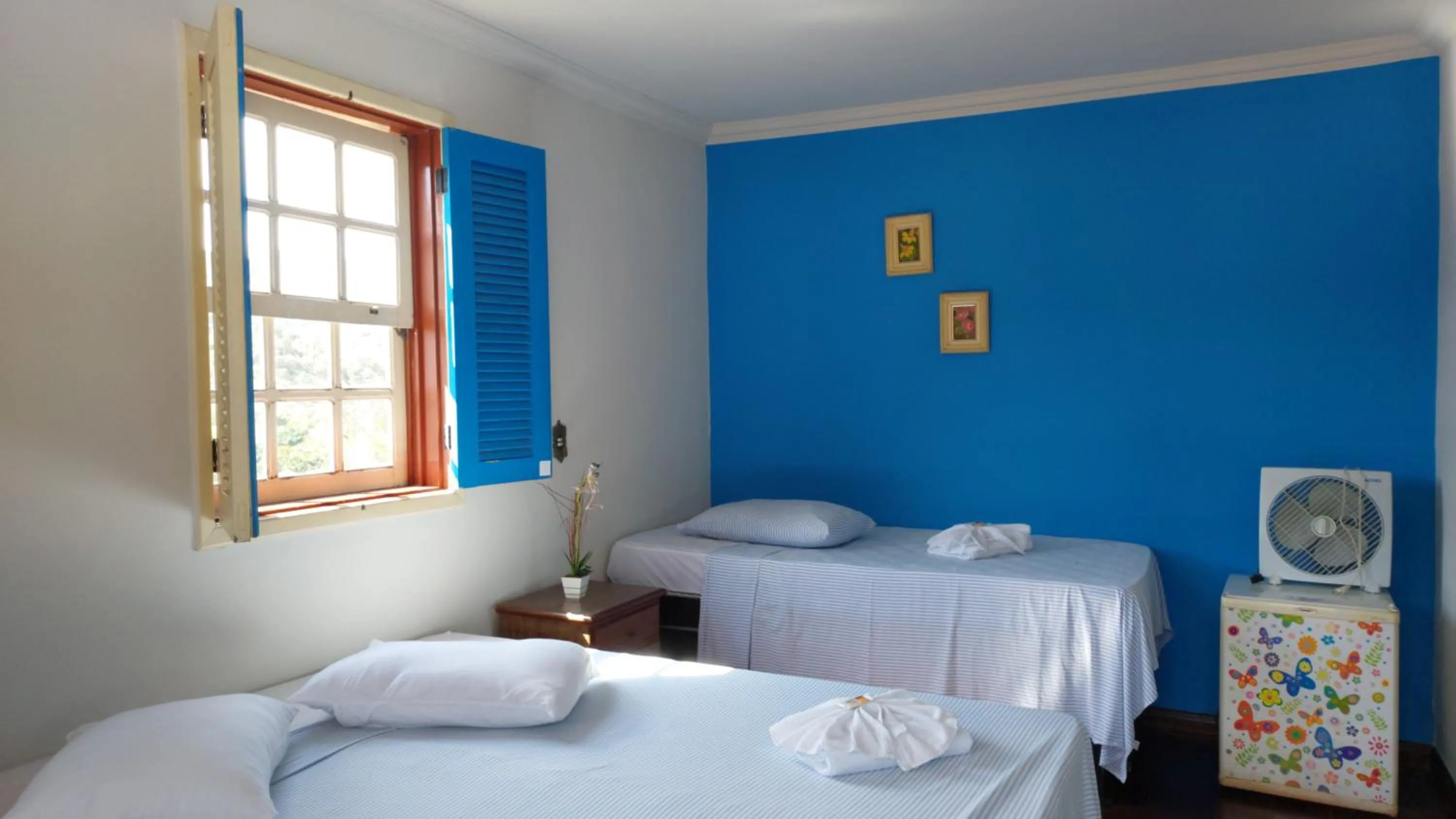 Bed in Pousada Ouro Preto