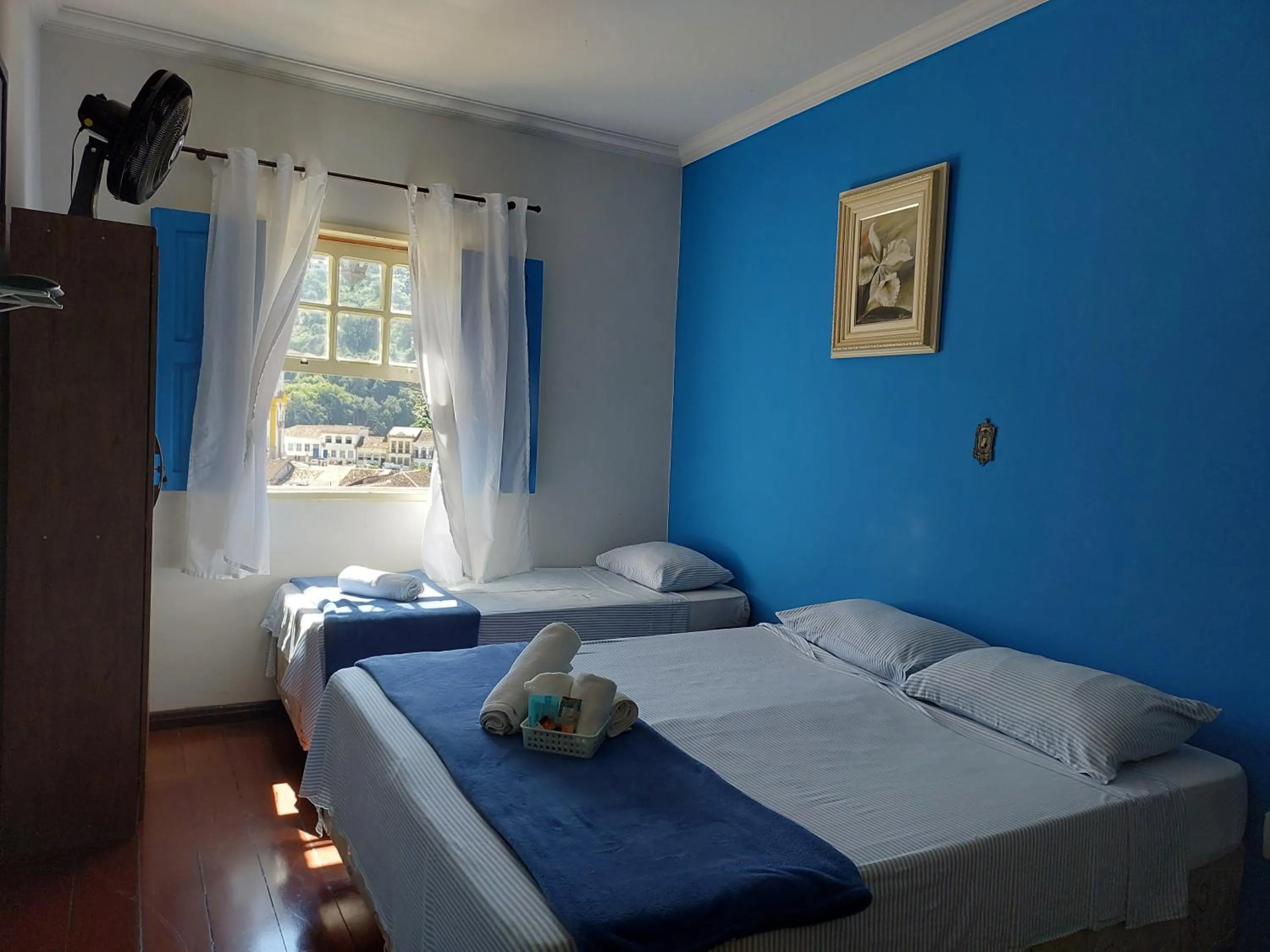 Bed in Pousada Ouro Preto