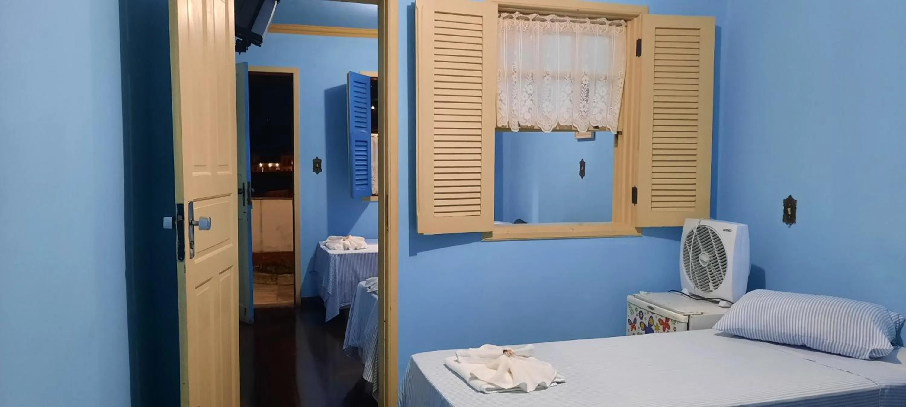 Bed in Pousada Ouro Preto