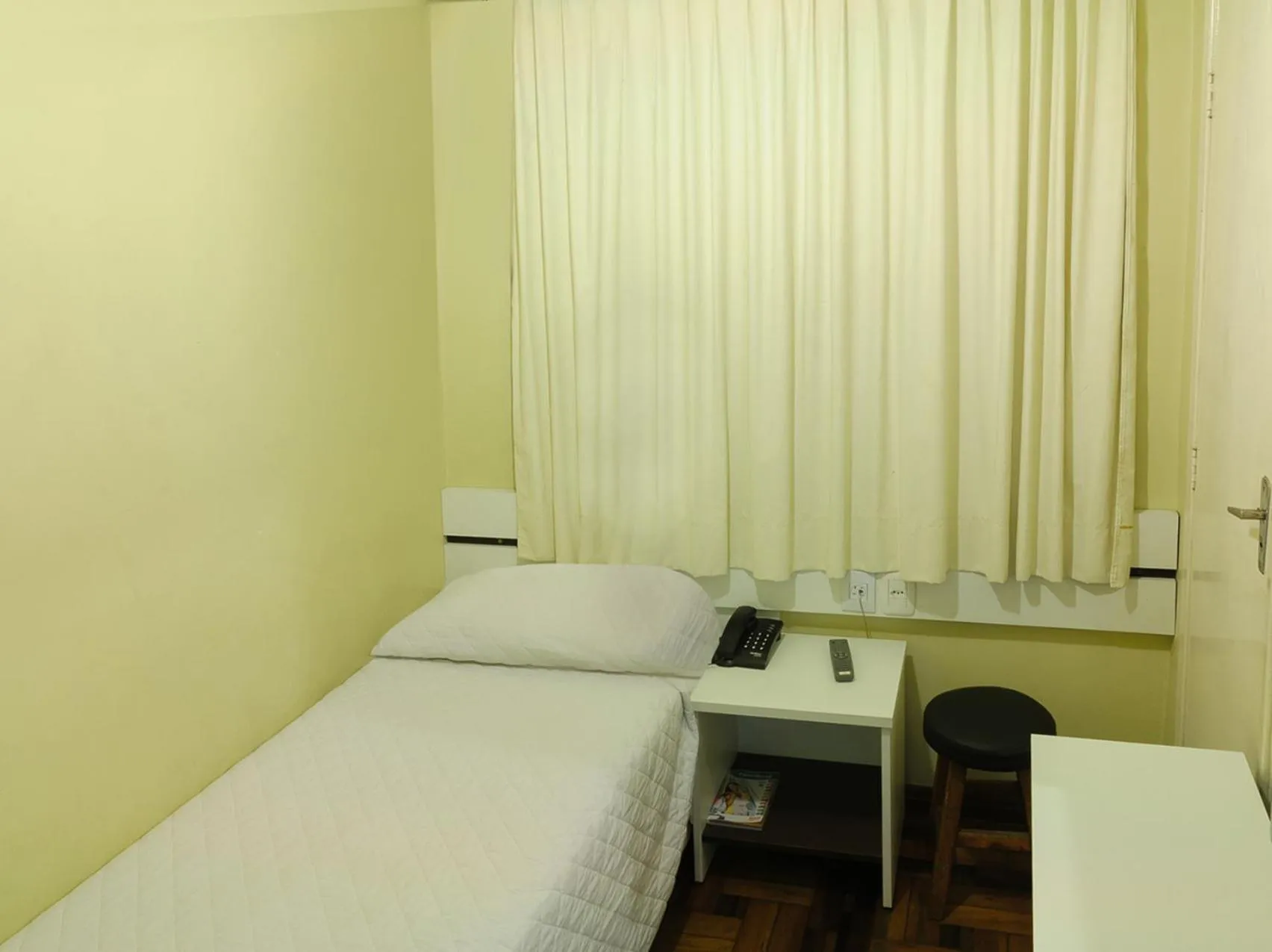 Bed in Hotel Elevado