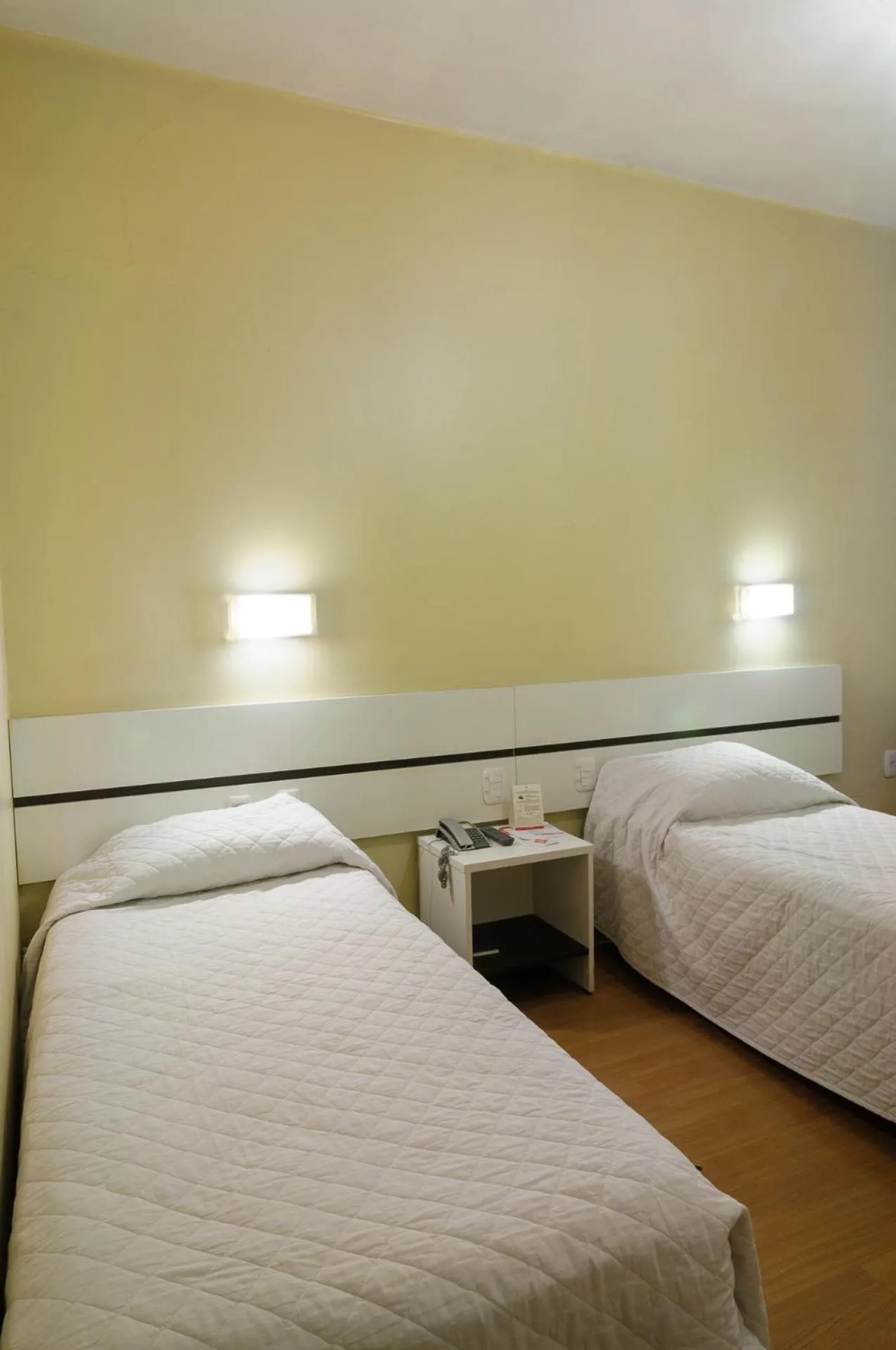 Bed in Hotel Elevado