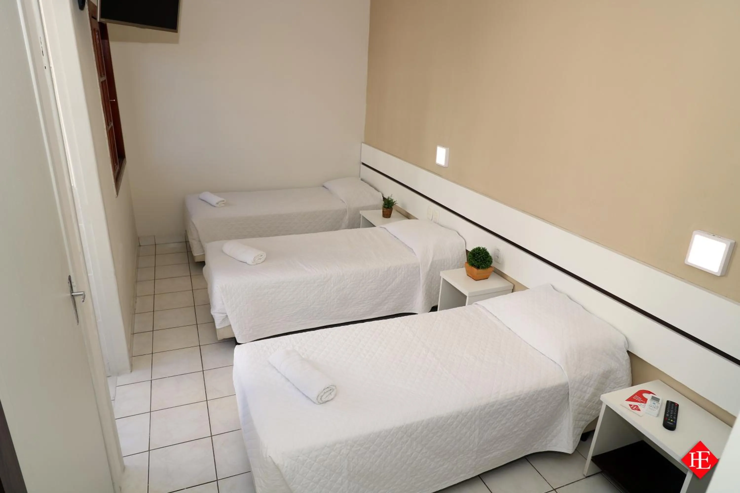 Bed in Hotel Elevado