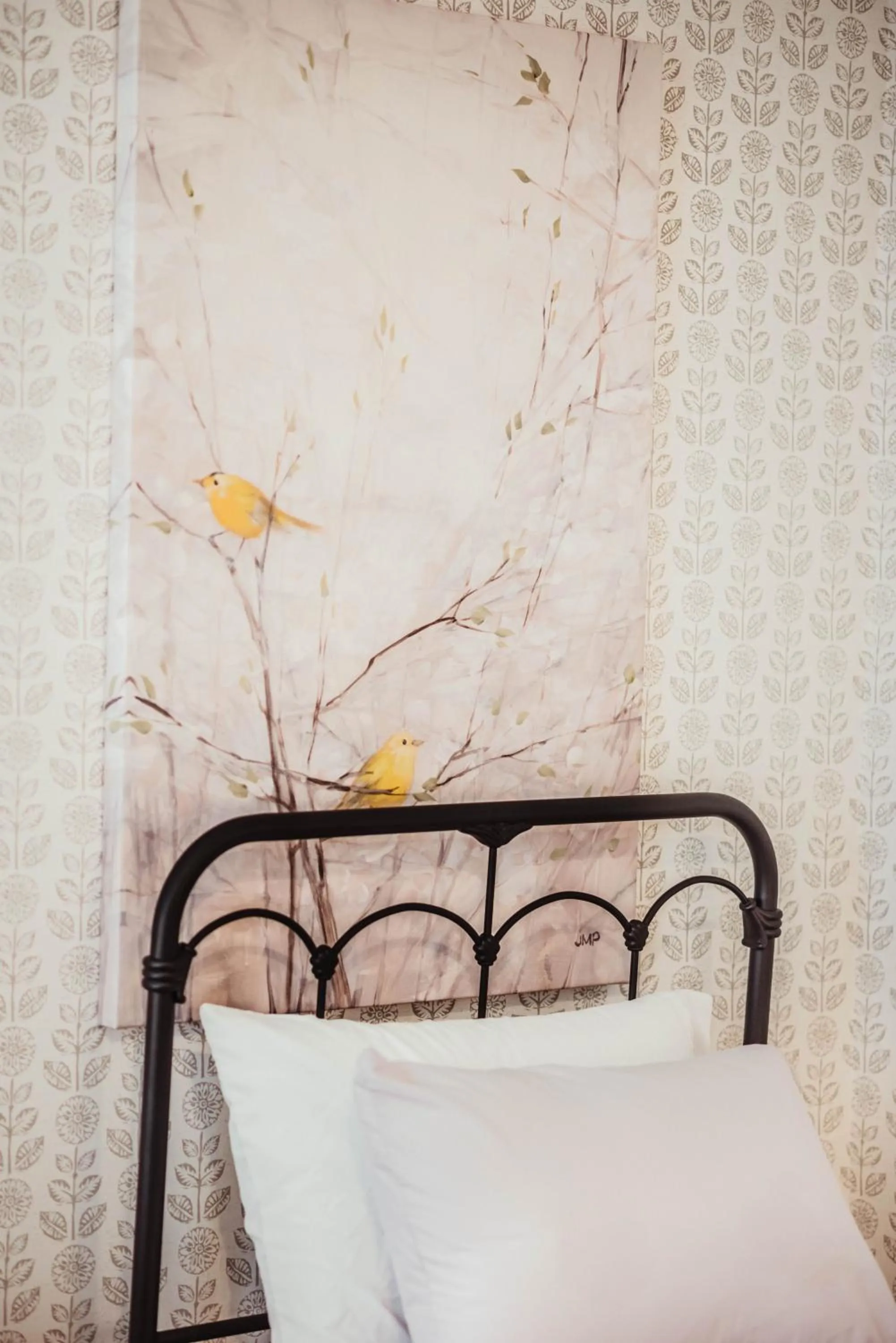 Bed in The Claiborne Bed and Breakfast