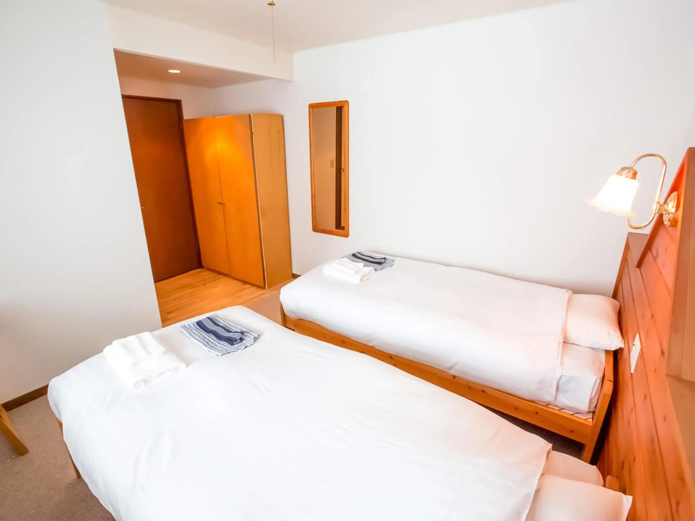 Bed in Rusutsu Lodges Pension Lilla Huset Bed in Rusutsu Lodges Pension Lilla Huset