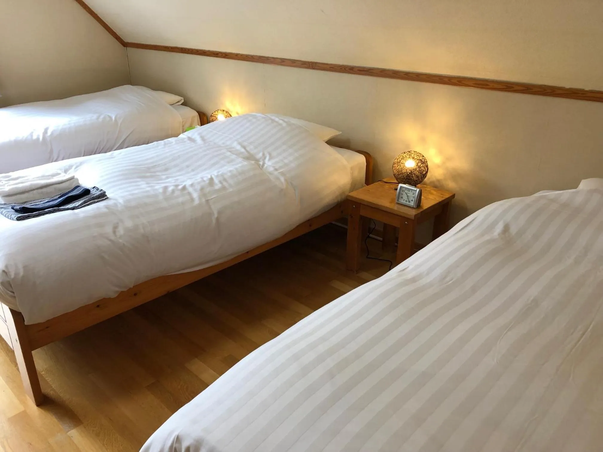 Photo of the whole room, Bed in Rusutsu Lodges Pension Lilla Huset
