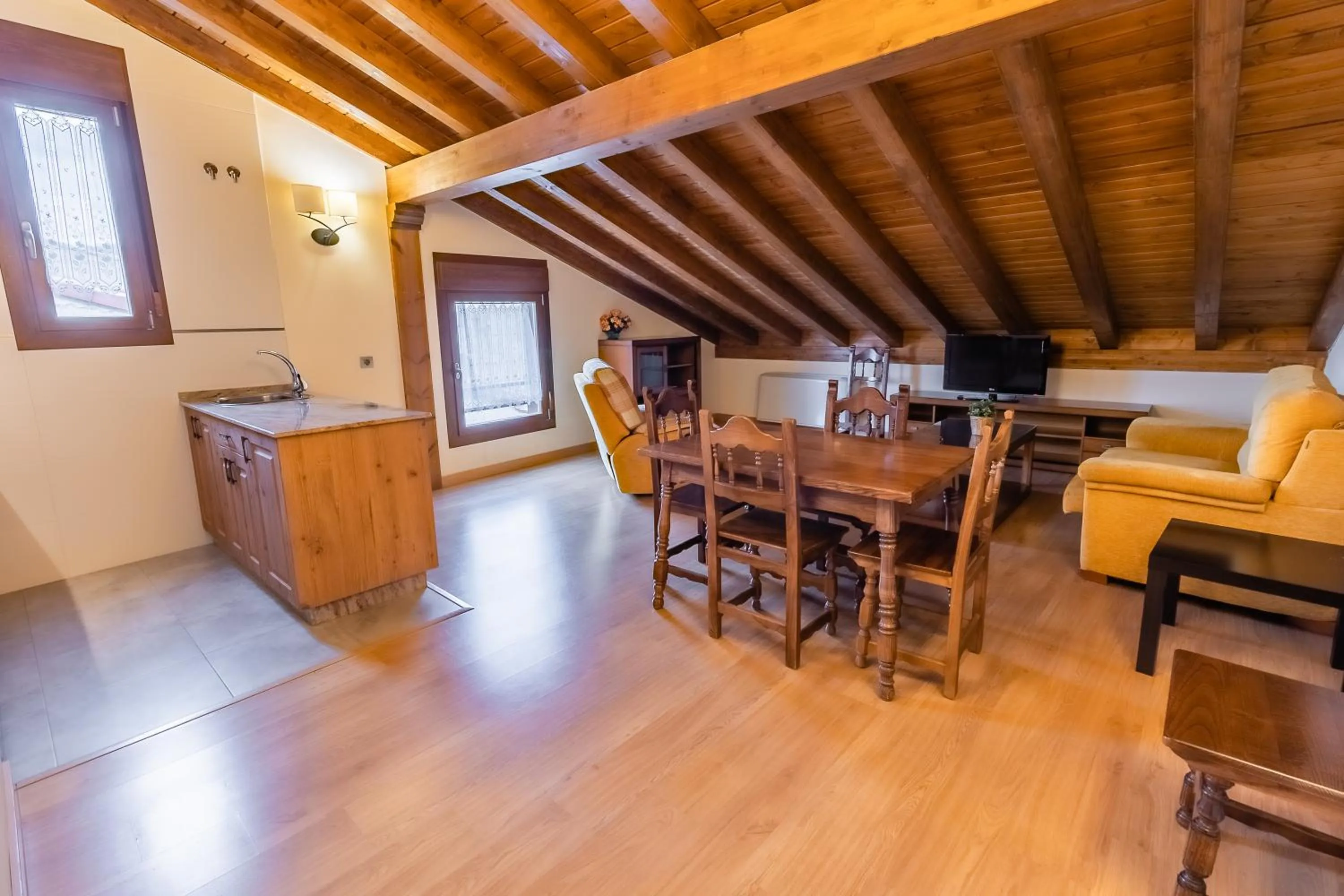 Photo of the whole room in Apartamentos & casas rurales Santo Domingo de Silos