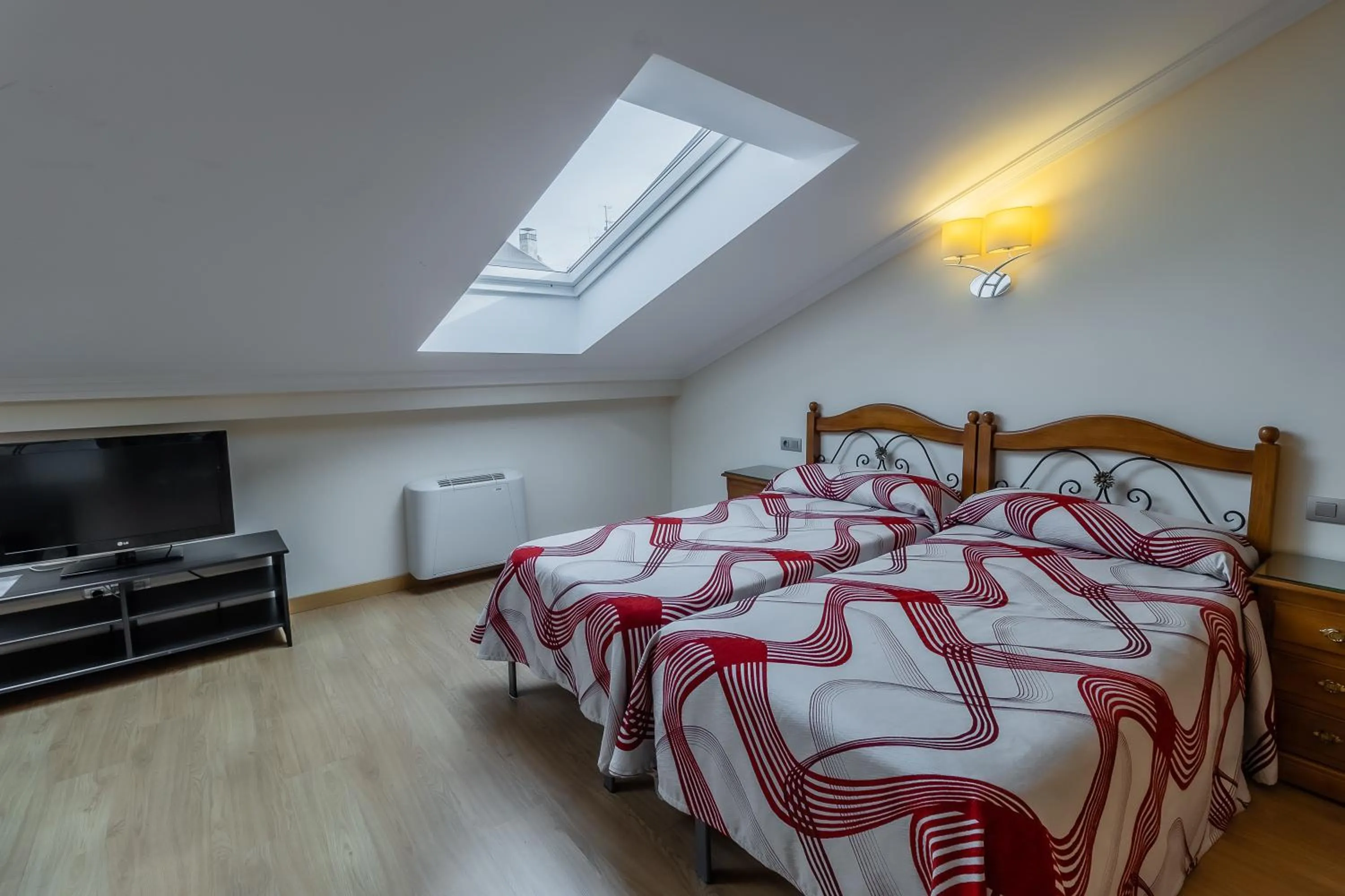 Bedroom, Bed in Apartamentos & casas rurales Santo Domingo de Silos