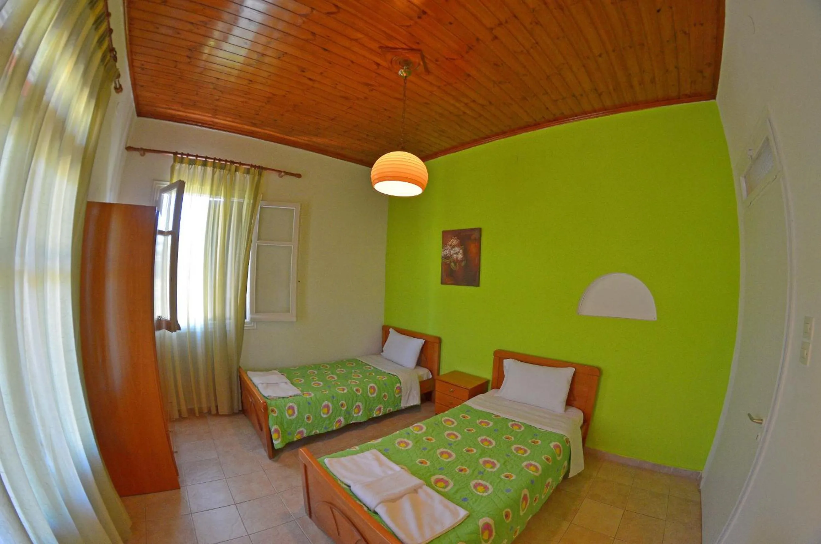 Bed in Othonas Apartments