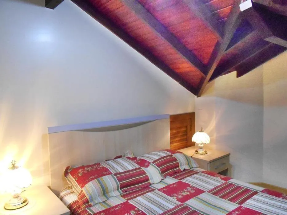 Bed in Cobertura duplex no centro de Gramado