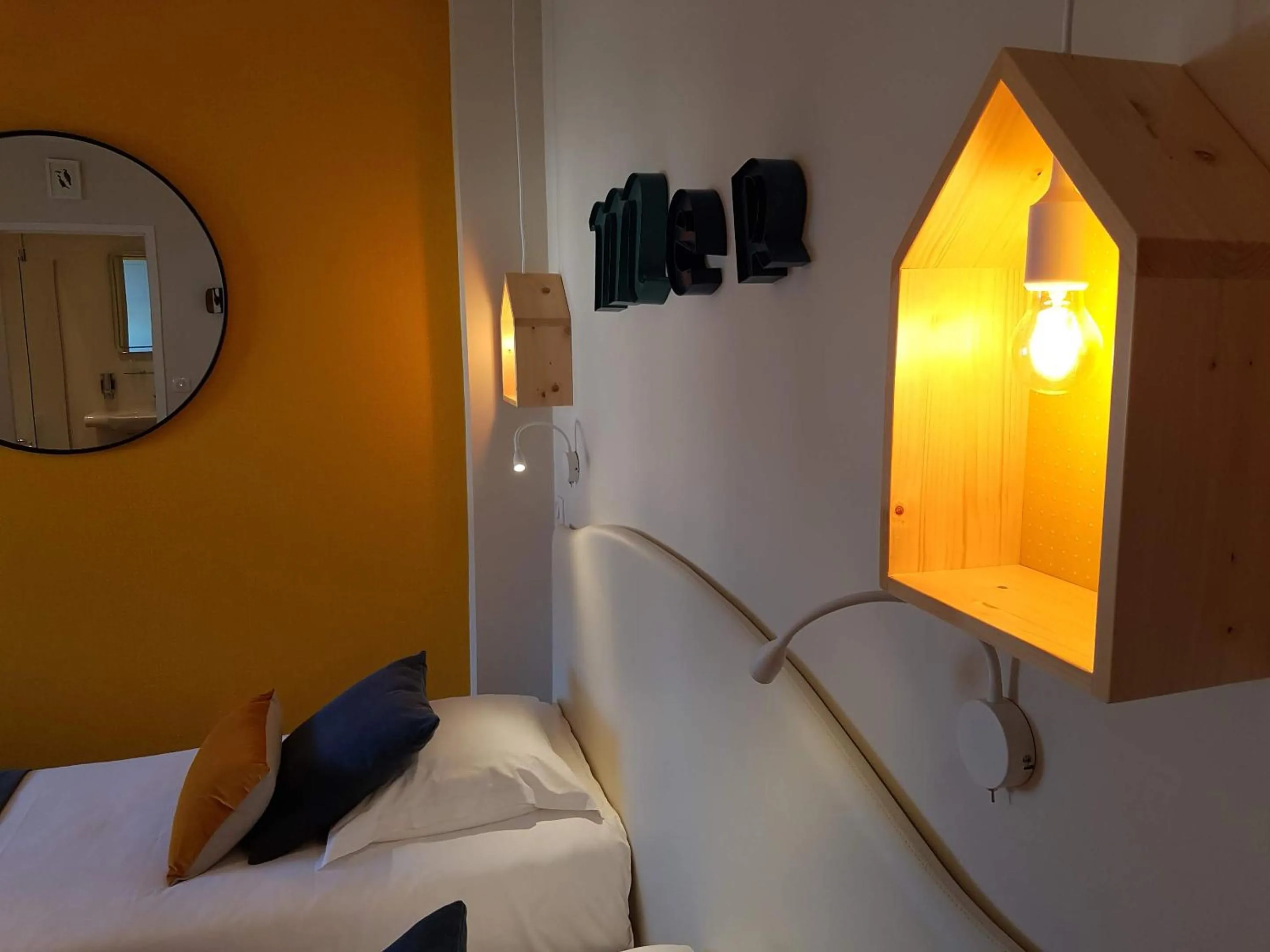 Bed in Les Chants d'Ailes - Hôtel Face Mer