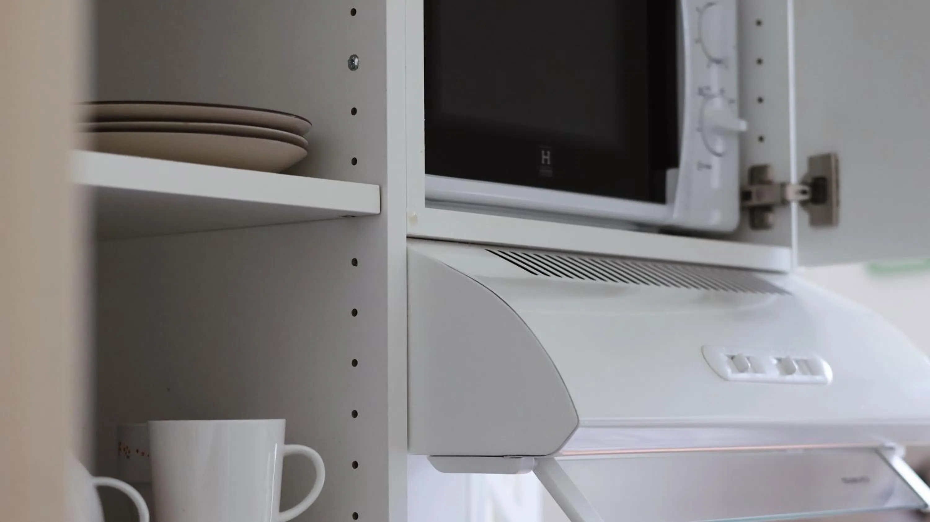 microwave in Huoneistohotelli Marja