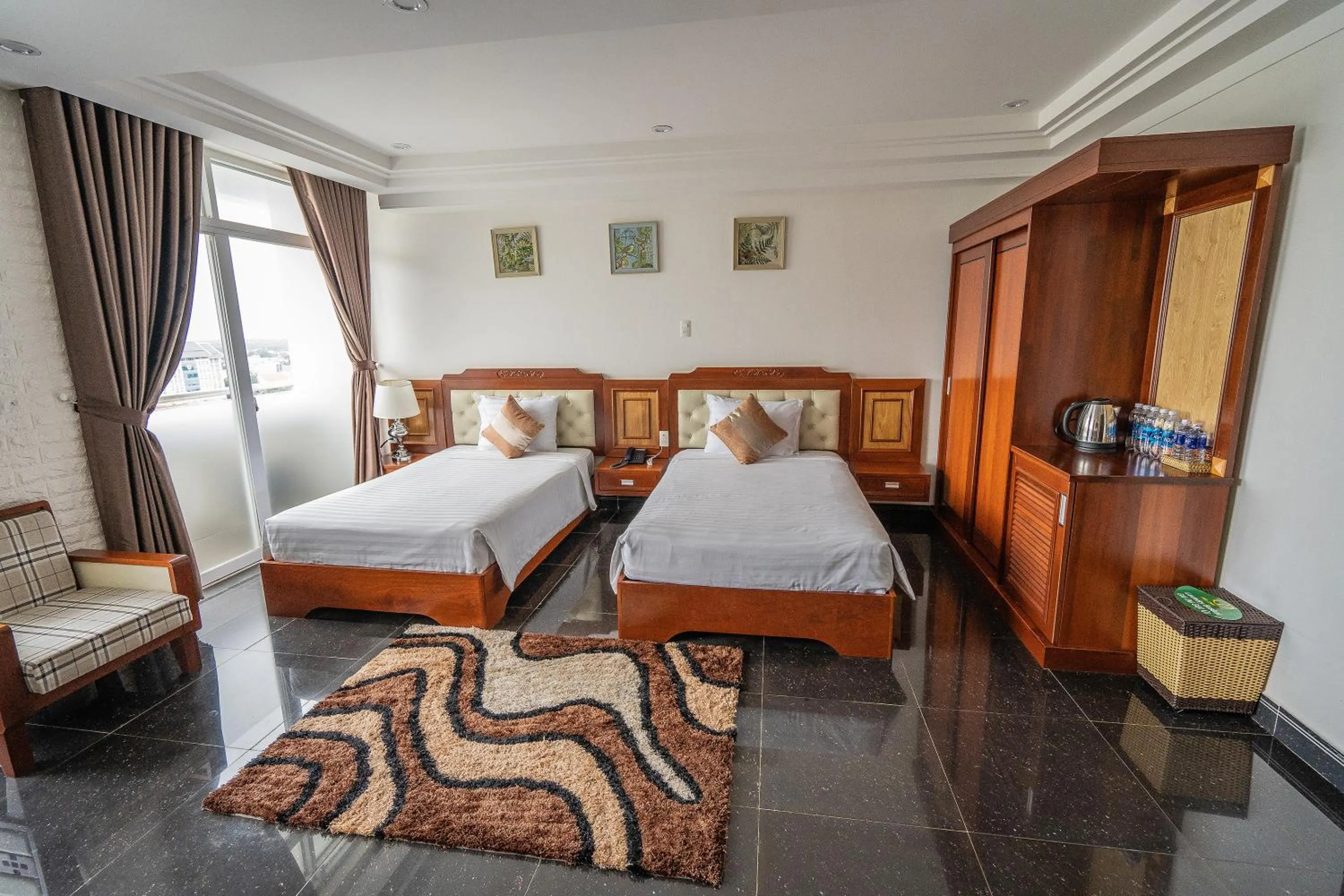 Bed in Duc Long Gia Lai Hotels & Apartment