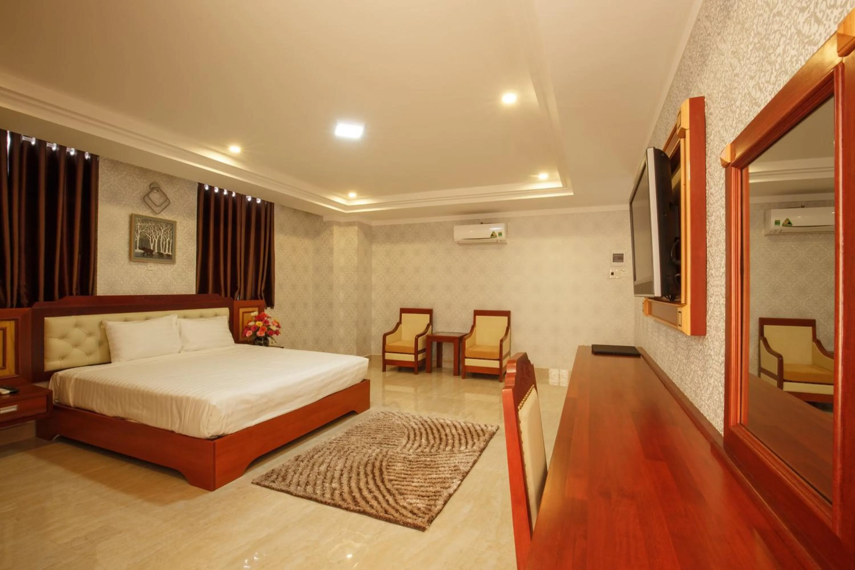 Bed in Duc Long Gia Lai Hotels & Apartment