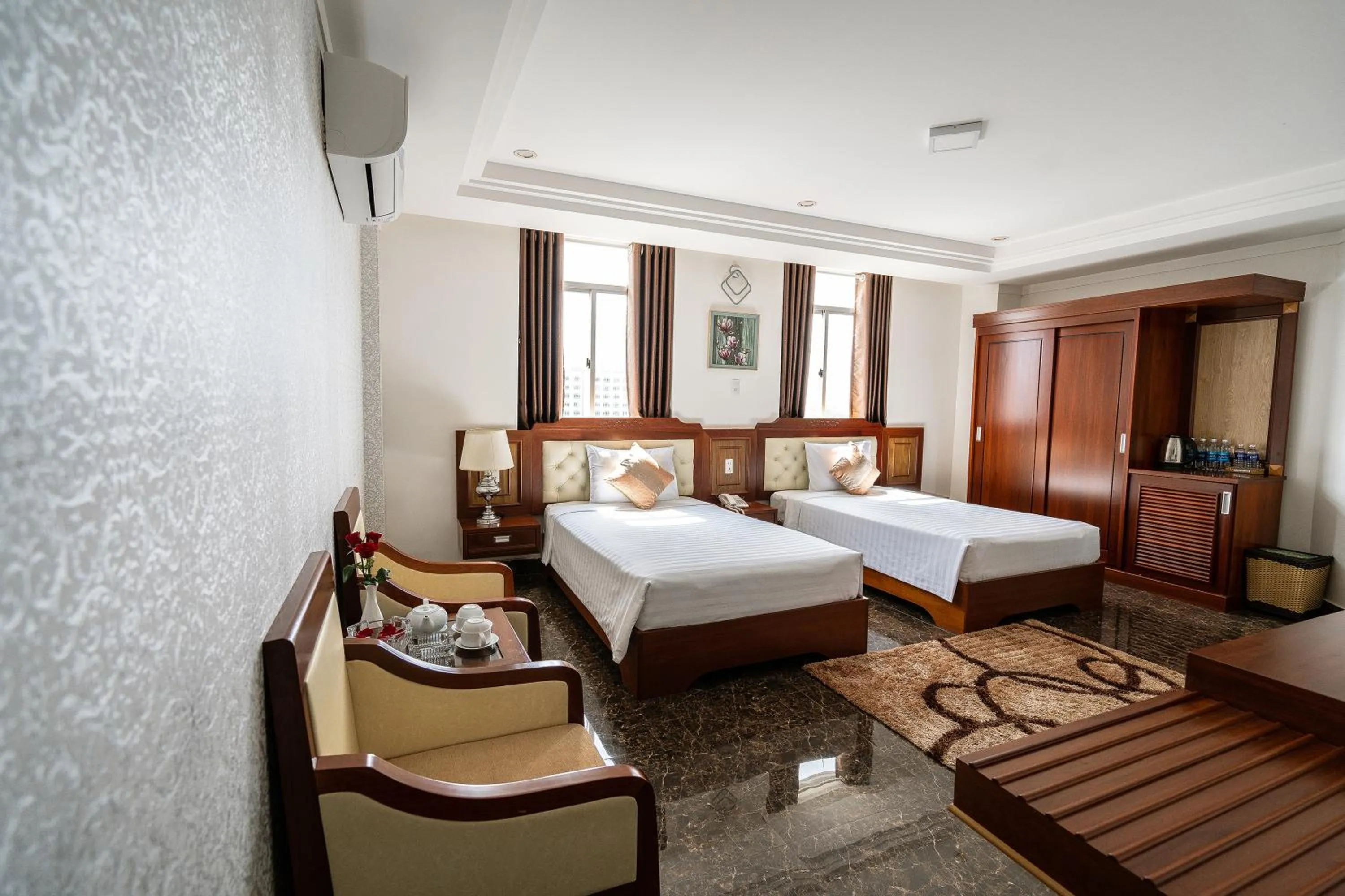 Bed in Duc Long Gia Lai Hotels & Apartment