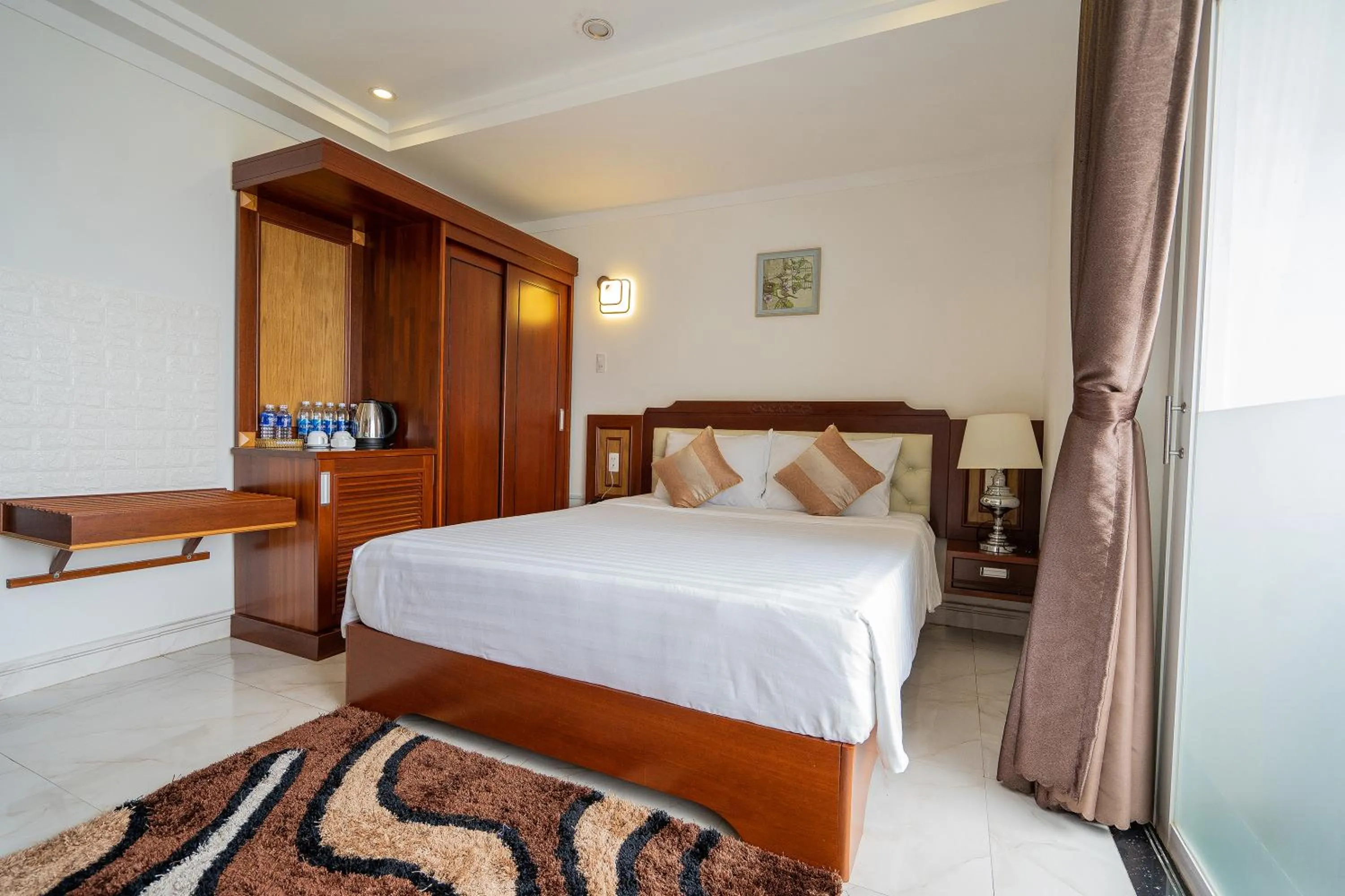 Bed in Duc Long Gia Lai Hotels & Apartment