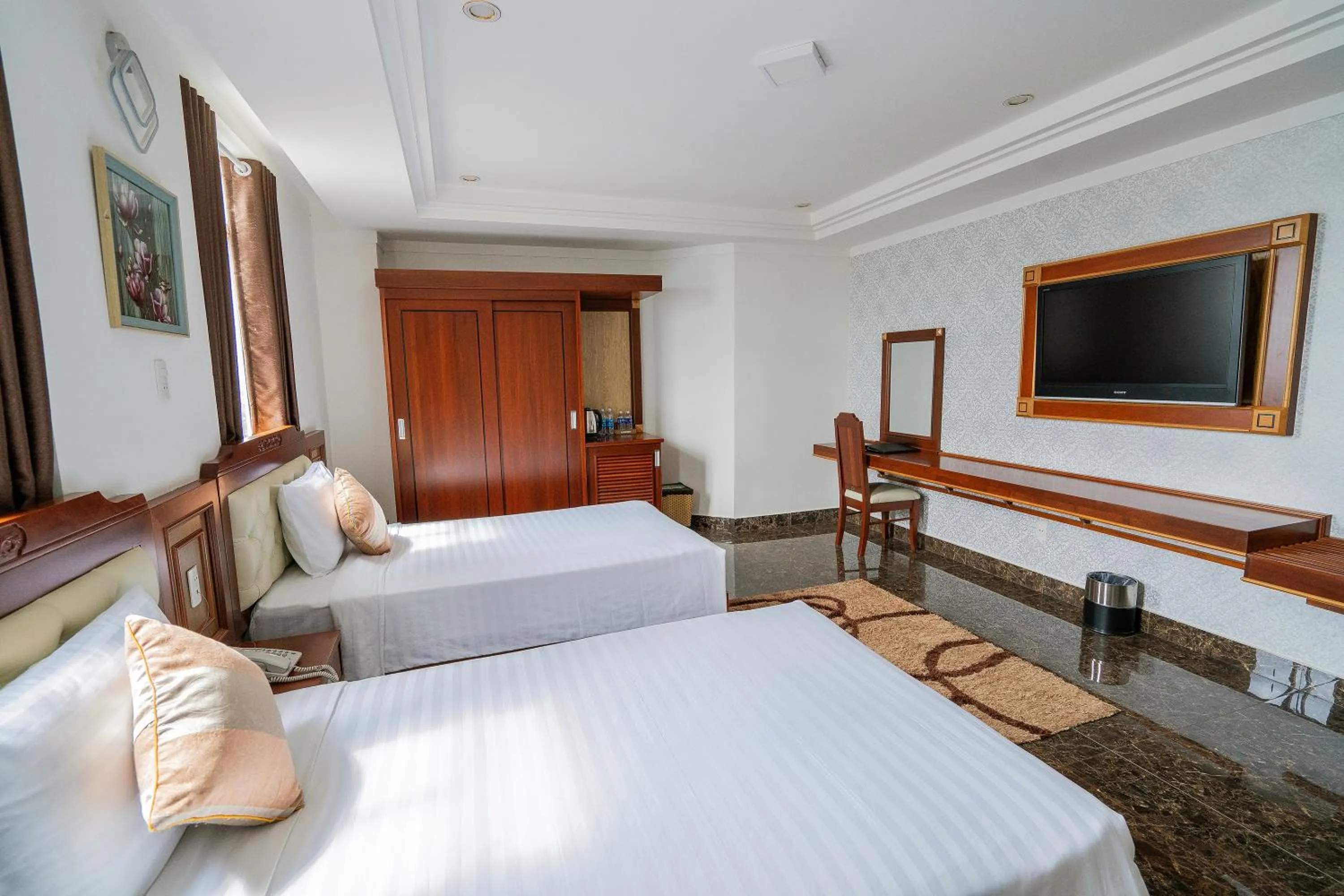 Bed in Duc Long Gia Lai Hotels & Apartment