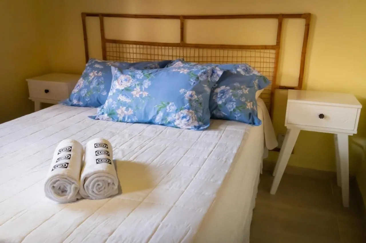 Bed in Pousada Gata Russa