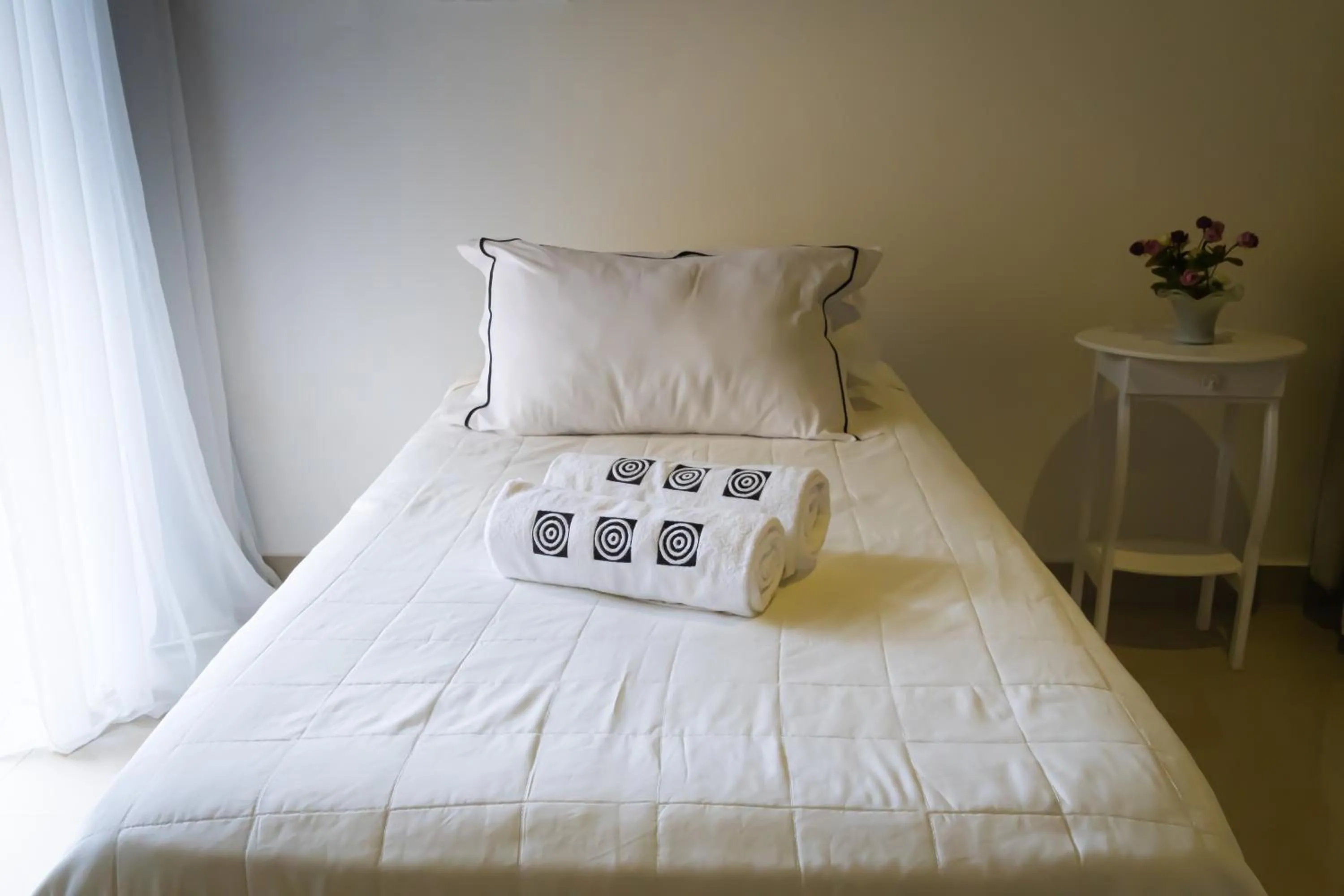 Bed in Pousada Gata Russa