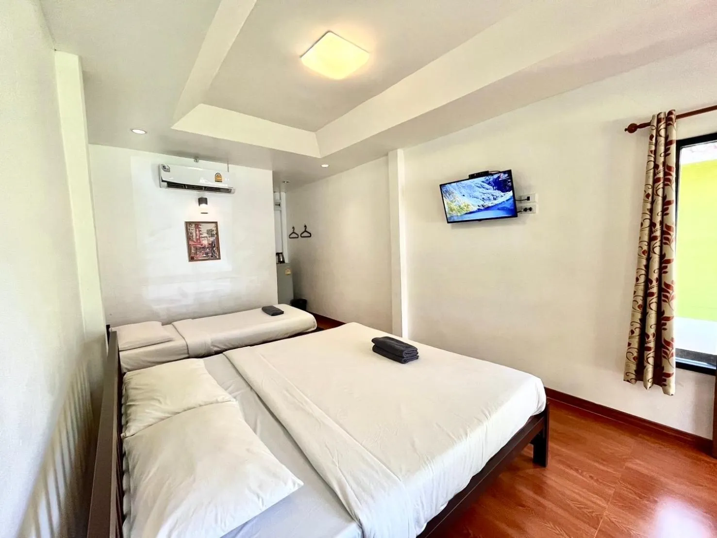 Bed in Thiw Tara Resort