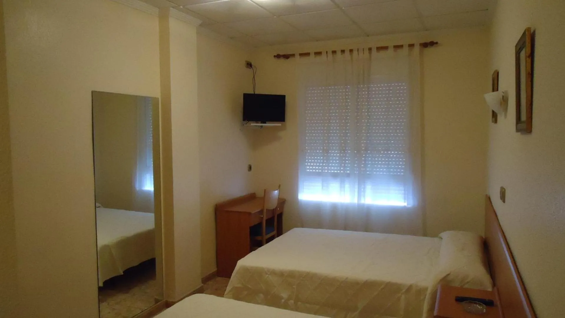 Bed in Pension Los Cisnes