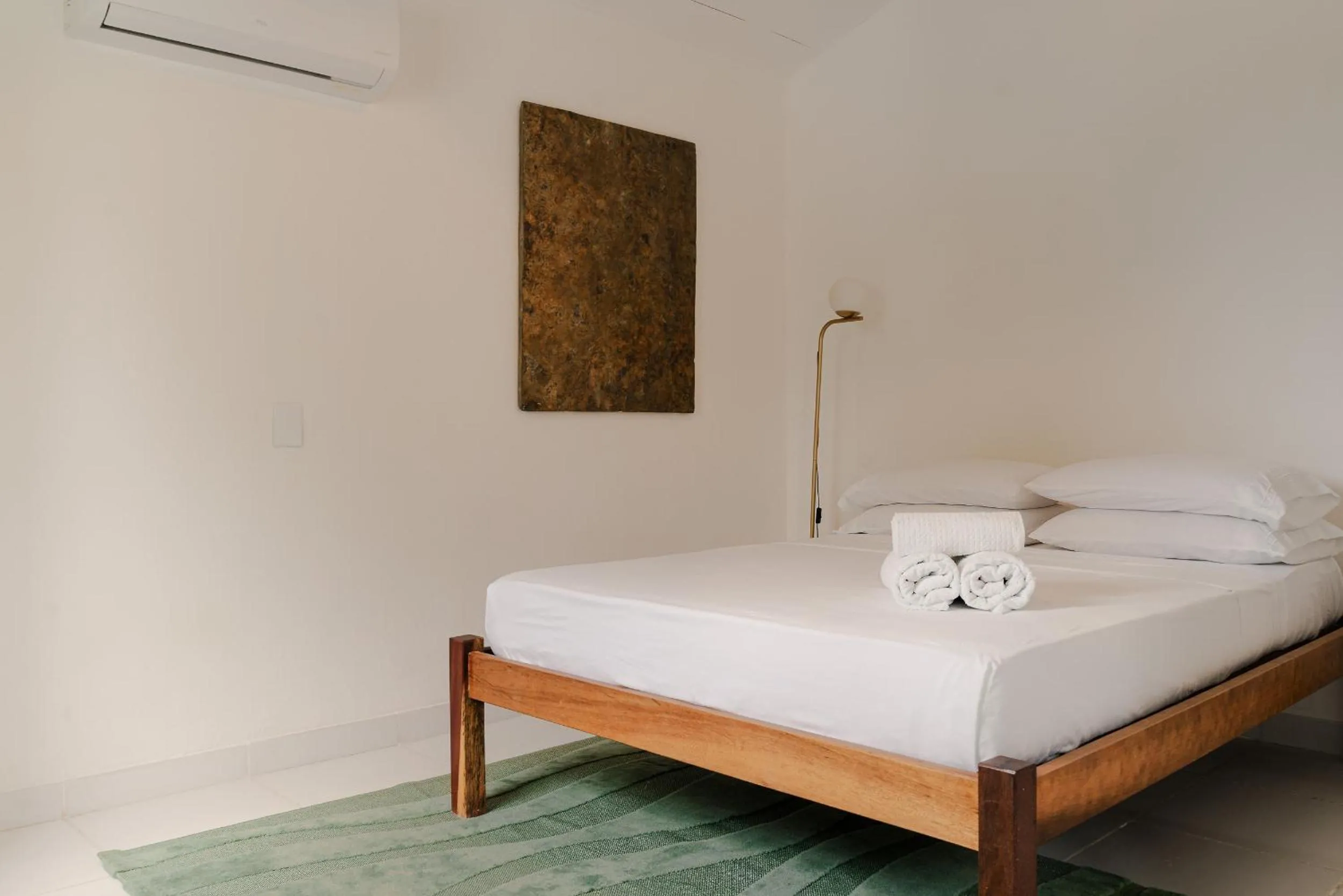 Bed in Jeri Suites accommodation
