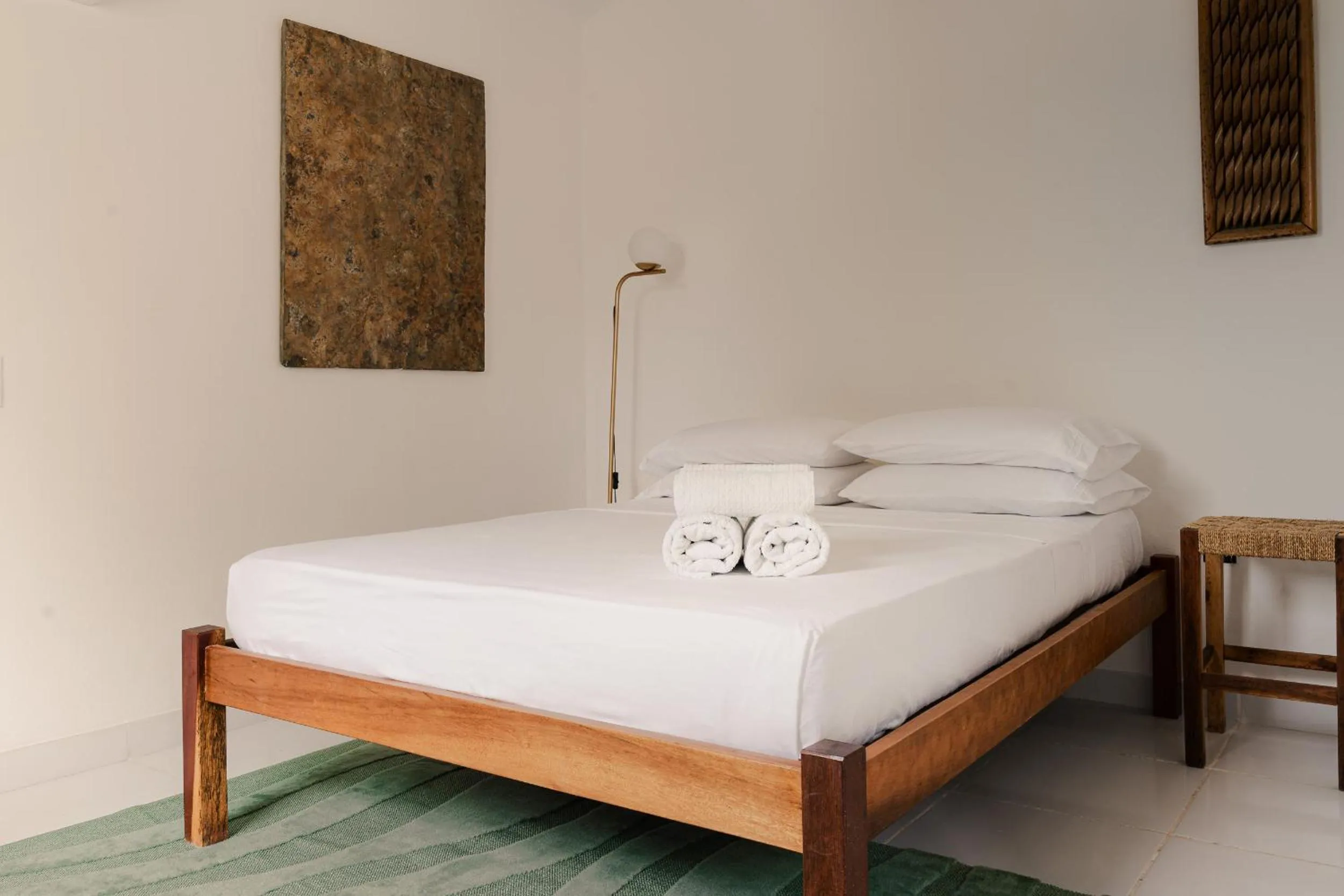 Bed in Jeri Suites accommodation