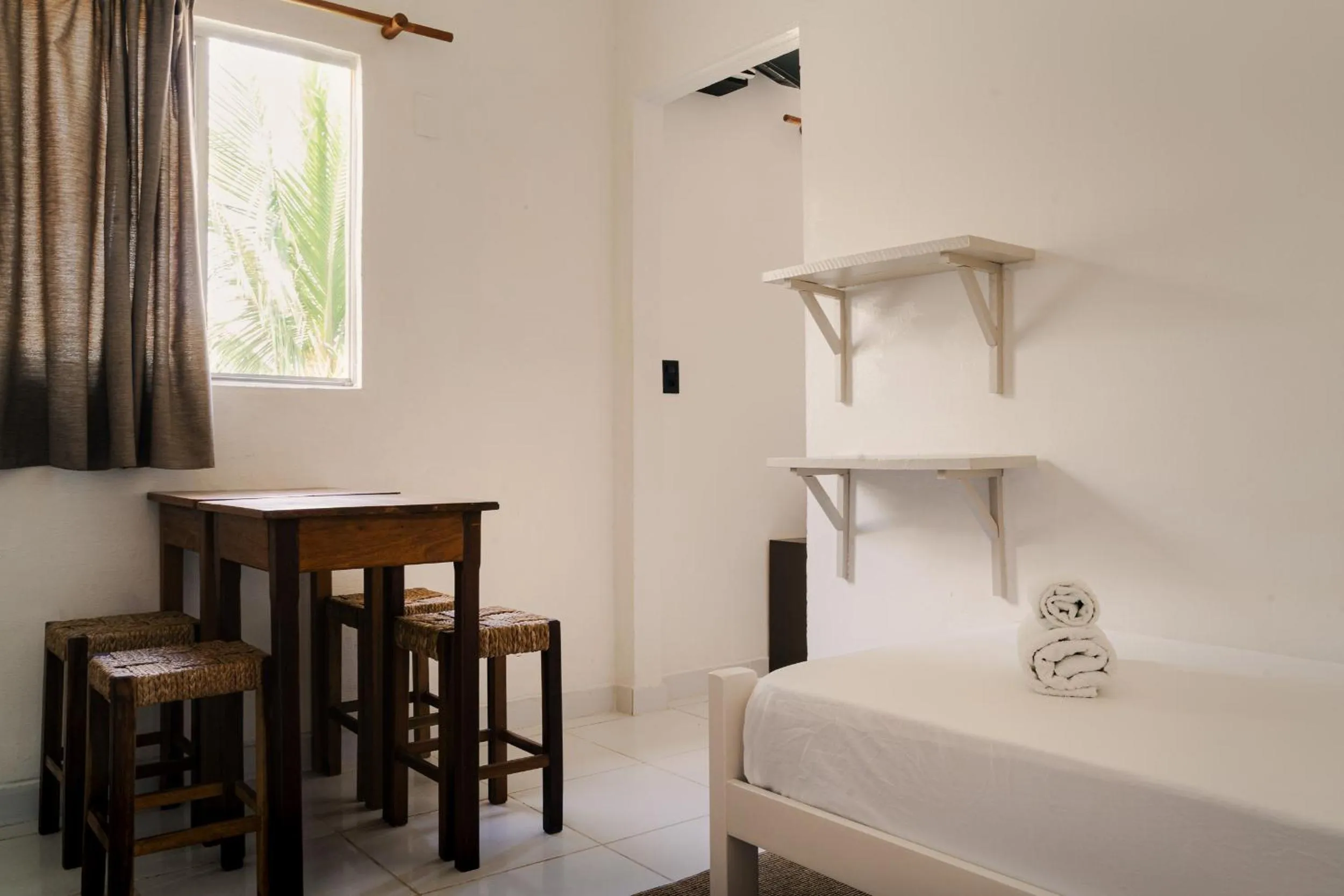 Bed in Jeri Suites accommodation