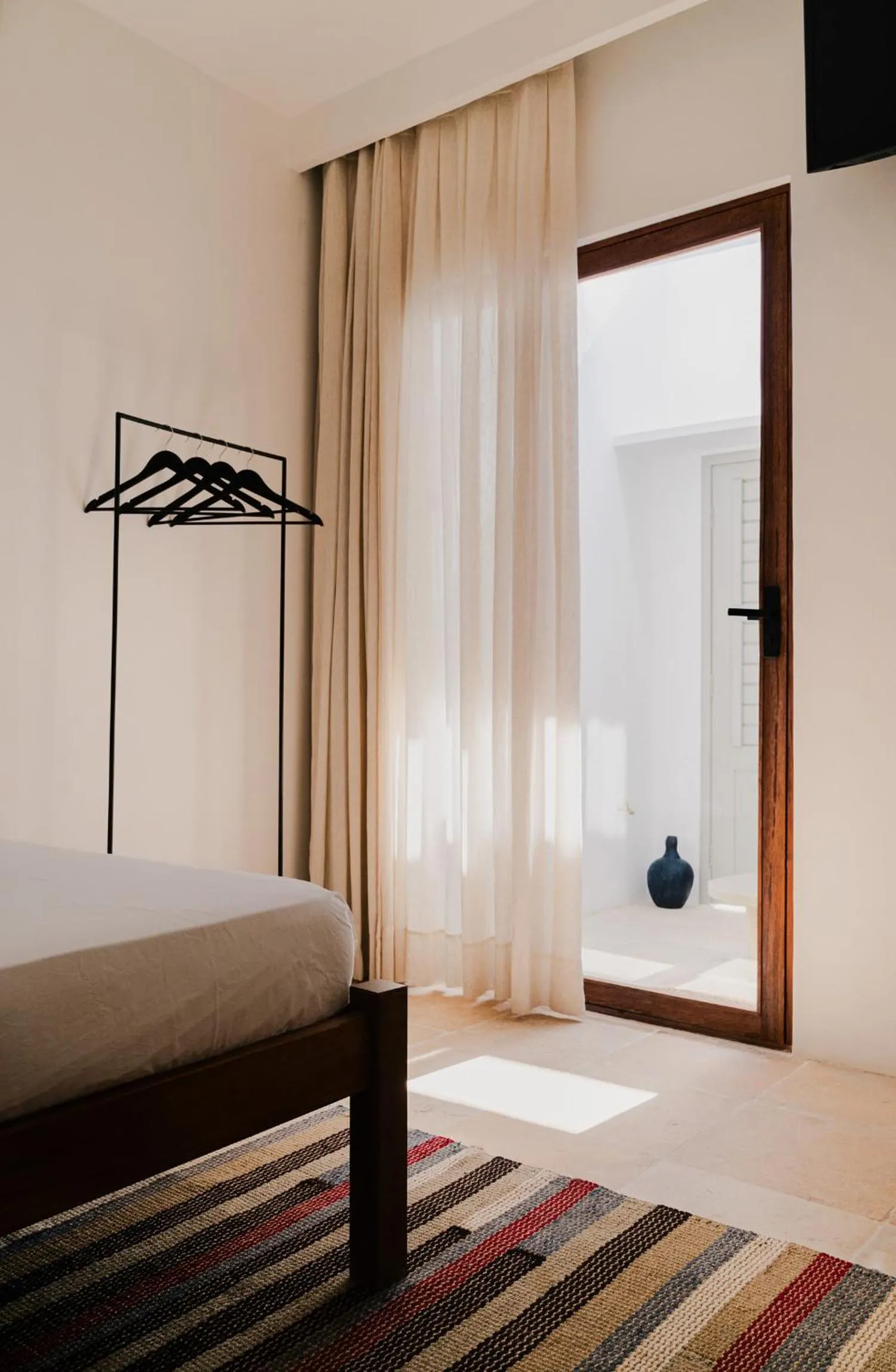 Bed in Jeri Suites accommodation