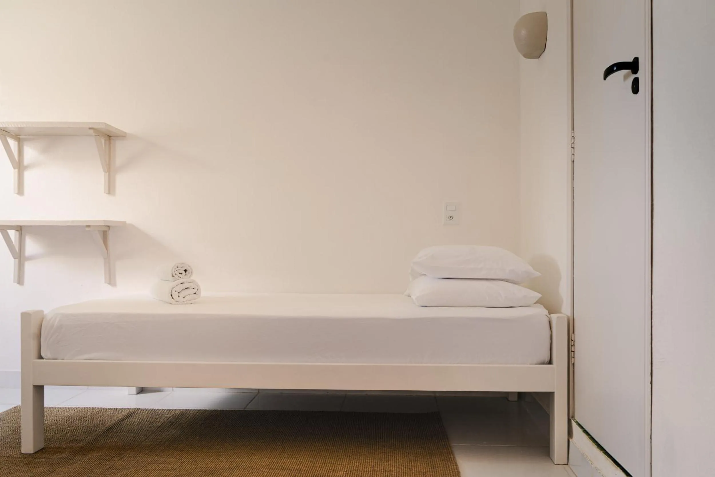 Bed in Jeri Suites accommodation