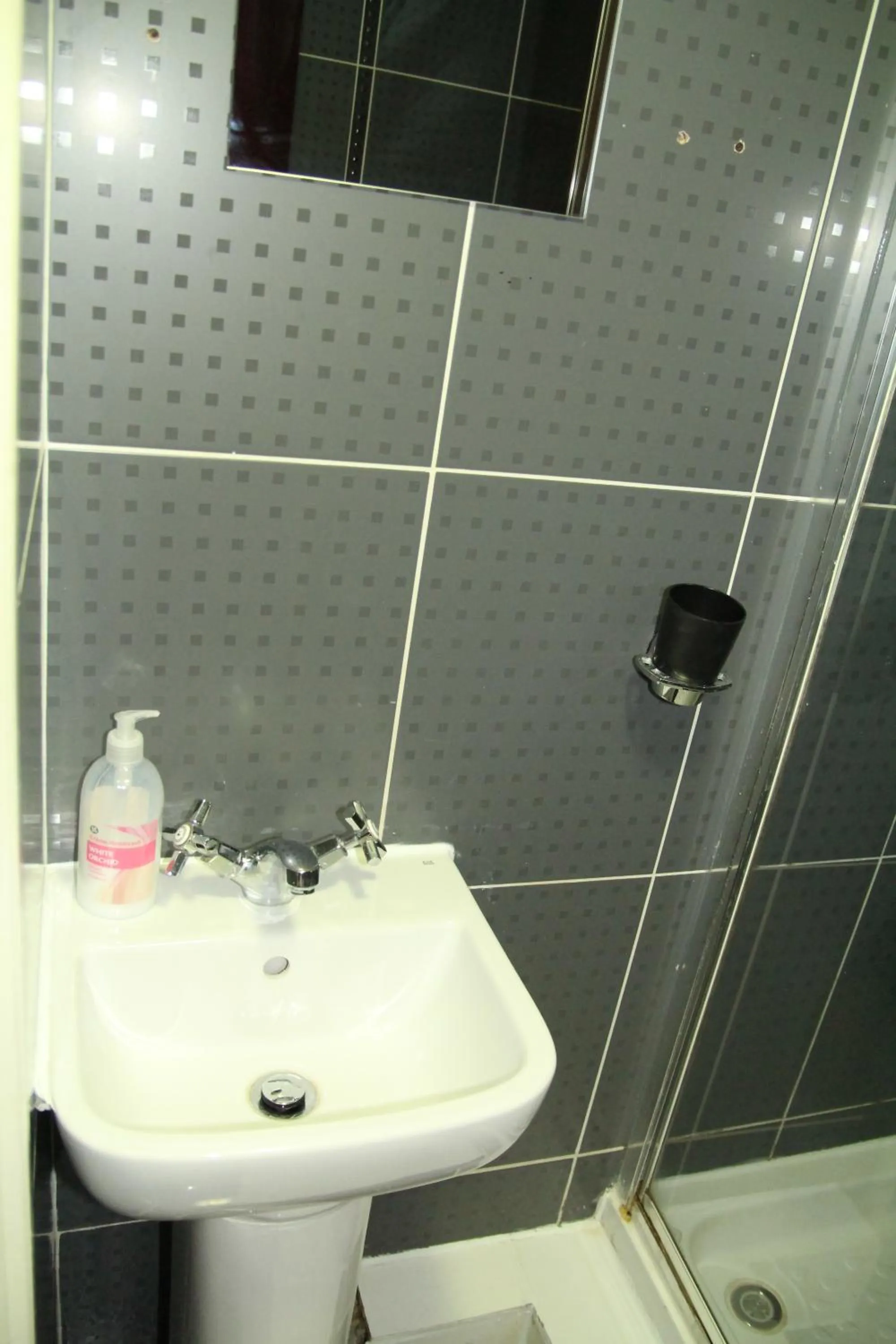 Bathroom in London Olympus Hotel Nirvana