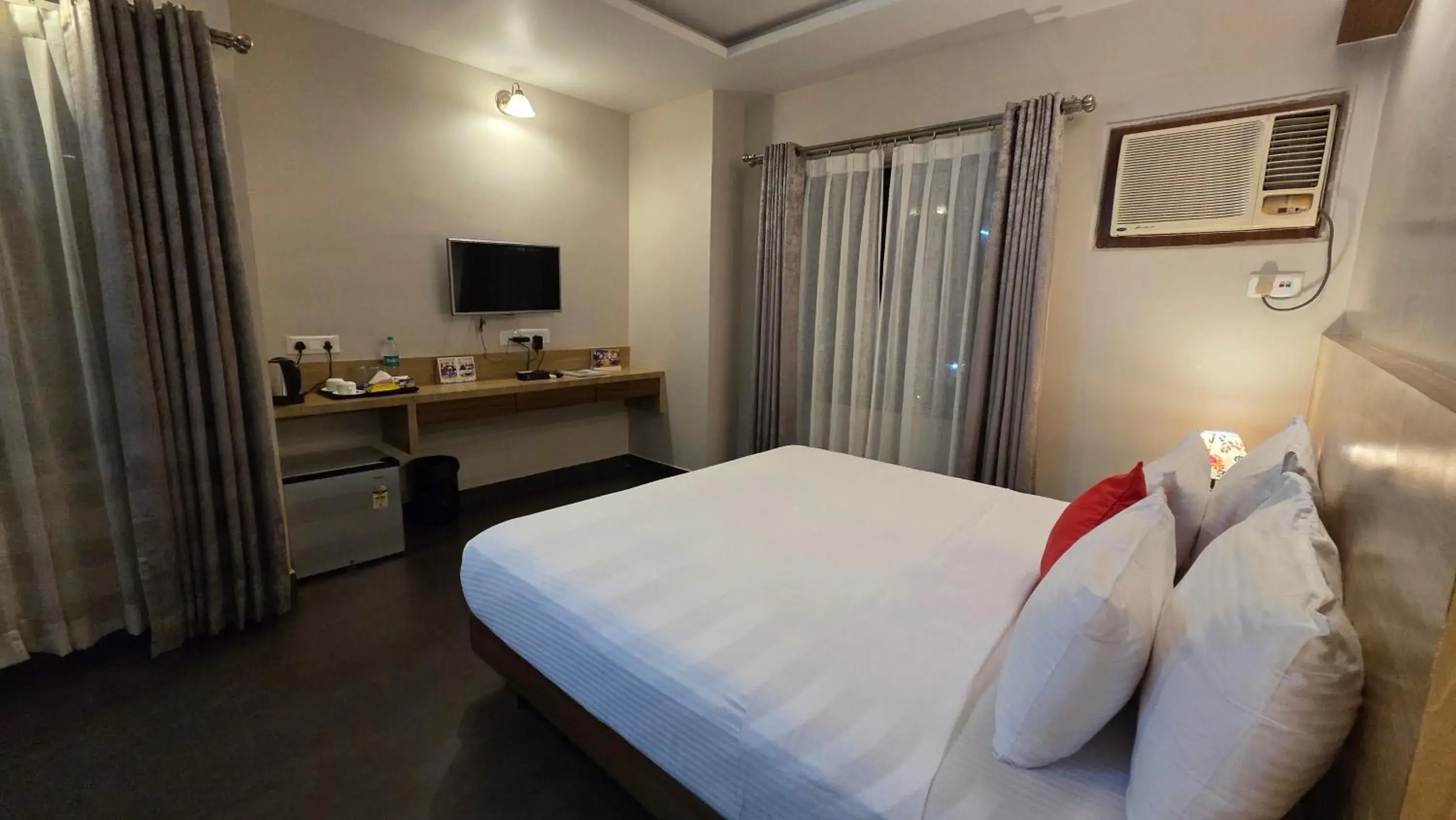 Bed in Hotel Gulmohar Grand Bed in Hotel Gulmohar Grand