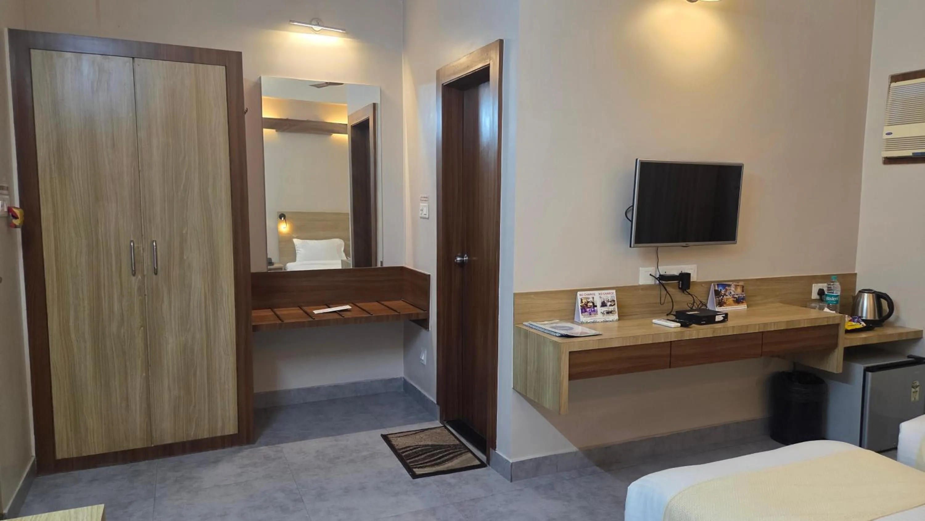 Photo of the whole room, Bed in Hotel Gulmohar Grand