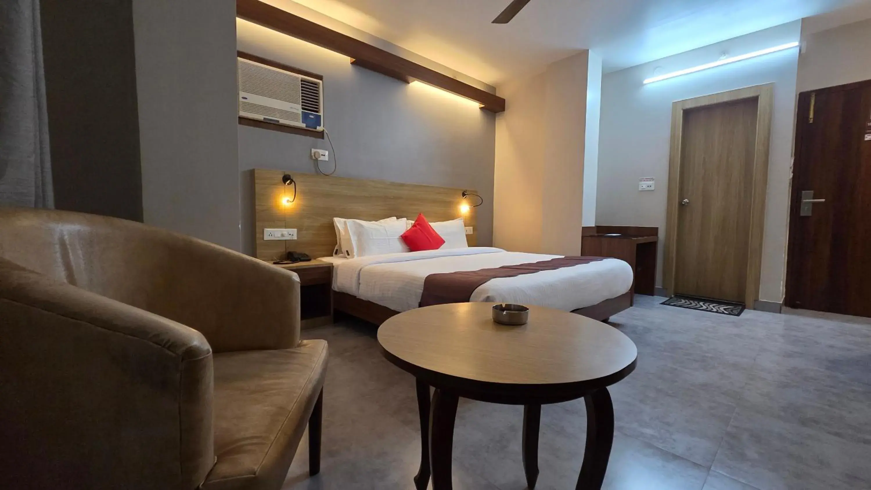 Photo of the whole room, Bed in Hotel Gulmohar Grand Photo of the whole room, Bed in Hotel Gulmohar Grand