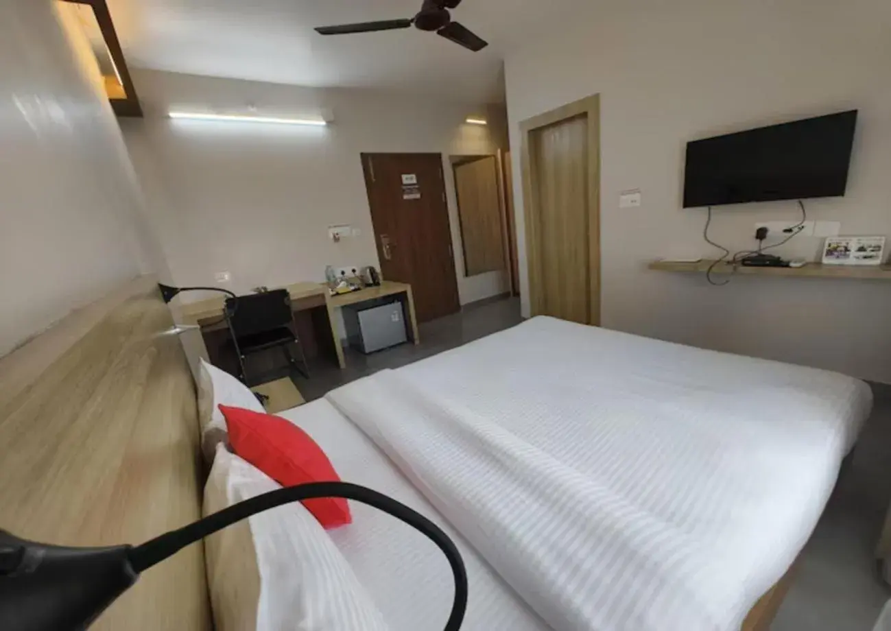 Bed in Hotel Gulmohar Grand Bed in Hotel Gulmohar Grand