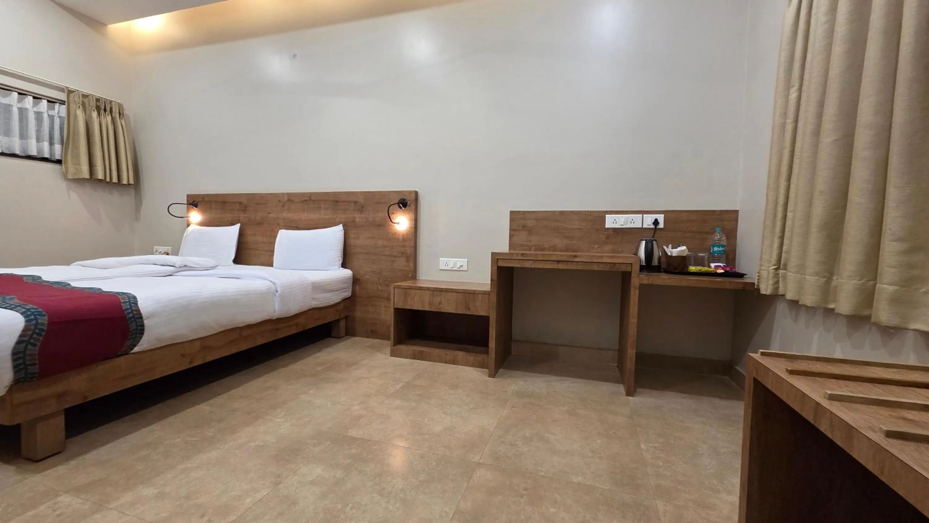 Photo of the whole room, Bed in Hotel Gulmohar Grand