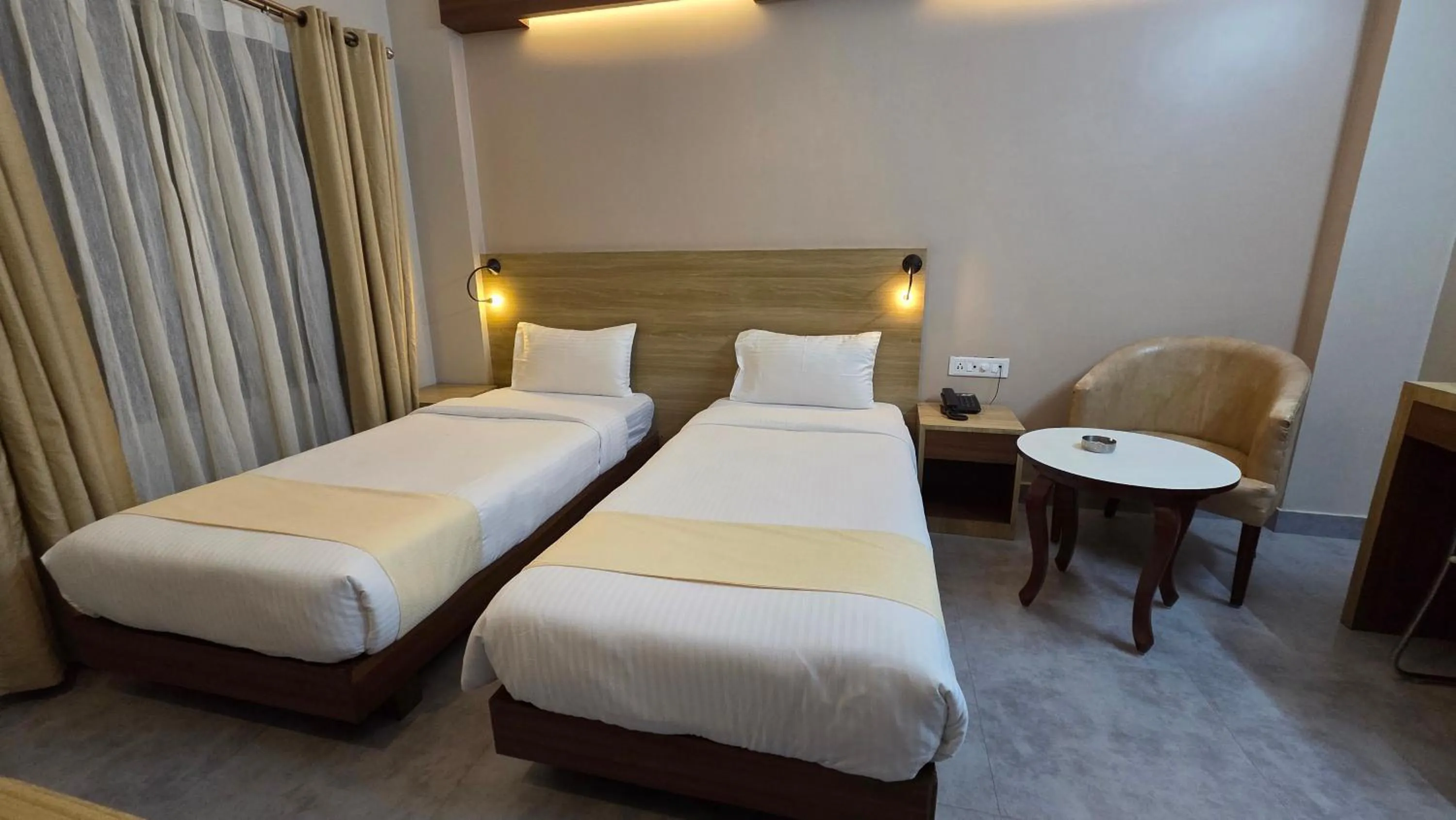 Bed in Hotel Gulmohar Grand