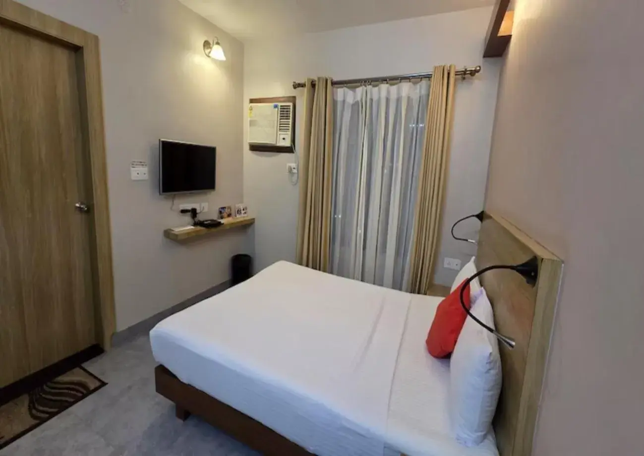 Bed in Hotel Gulmohar Grand Bed in Hotel Gulmohar Grand