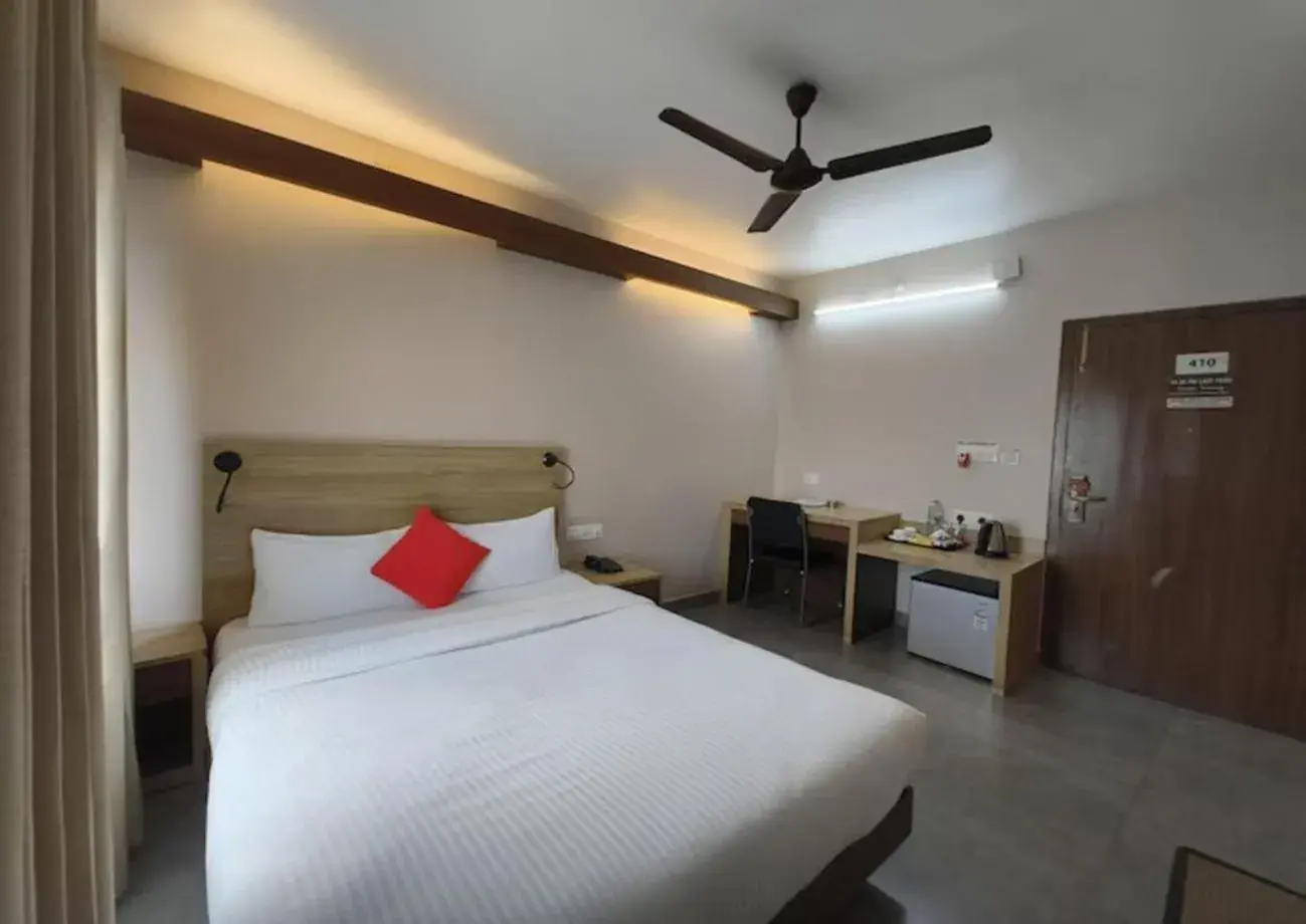 Bed in Hotel Gulmohar Grand Bed in Hotel Gulmohar Grand